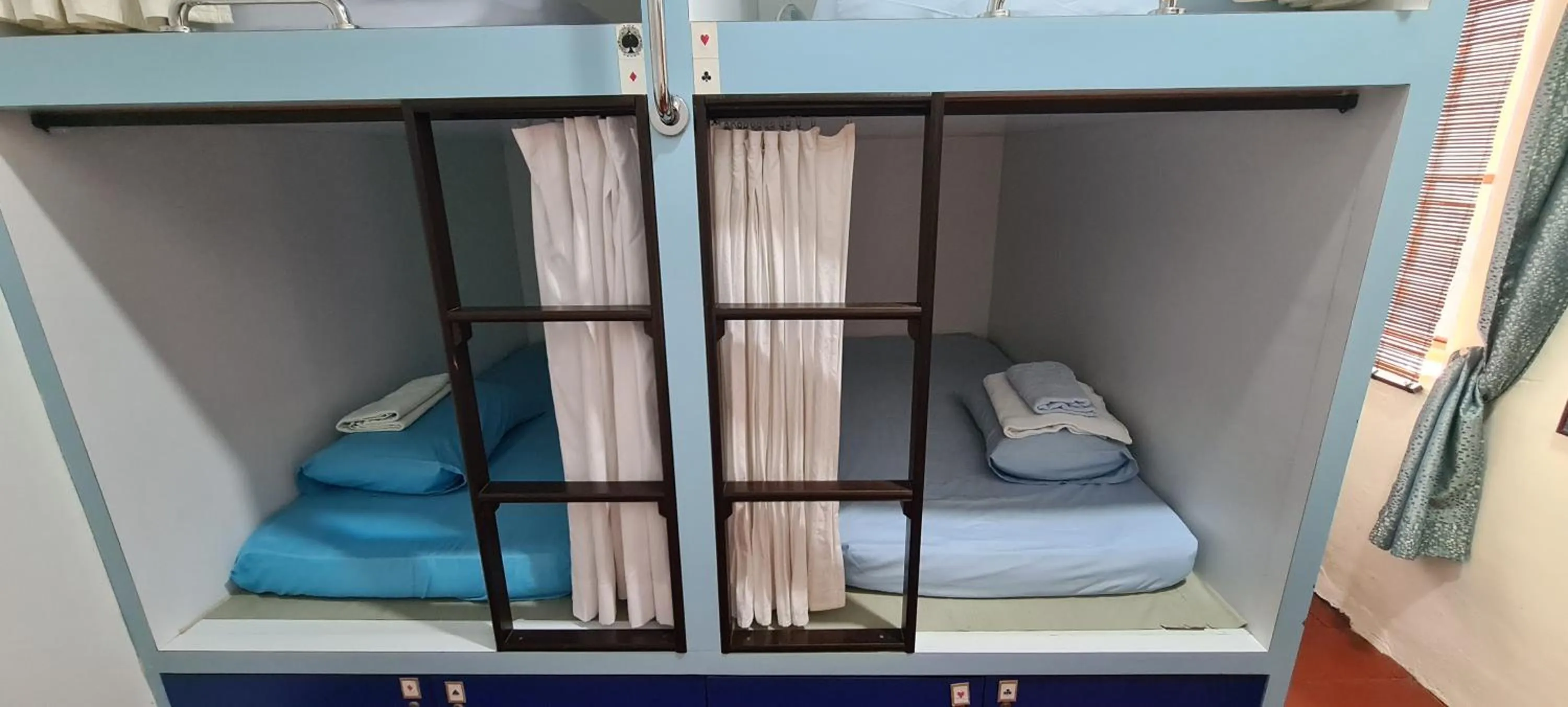 Bed in Sojourn Beds & Cafe