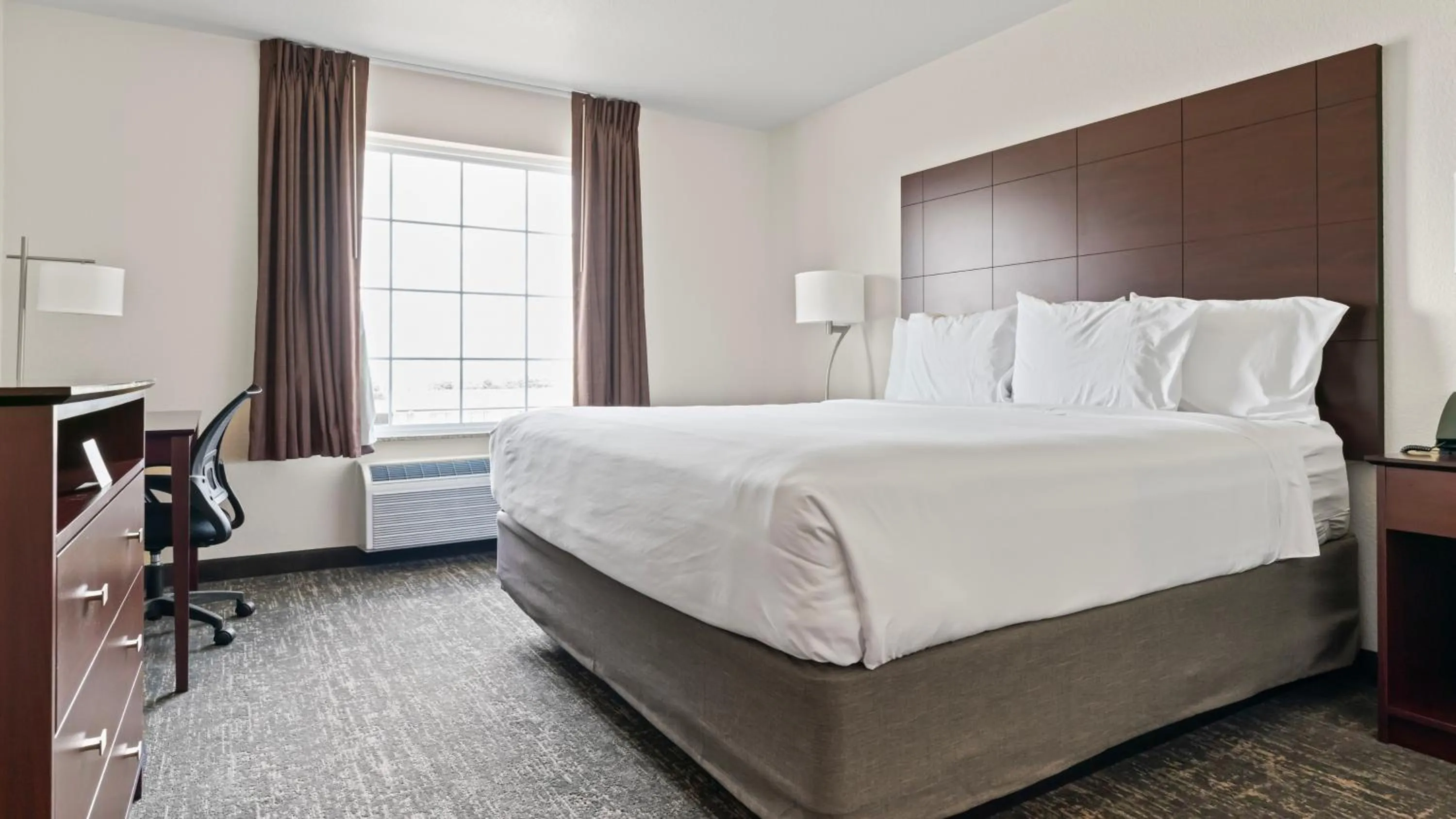 Bed in Cobblestone Inn & Suites - Julesburg