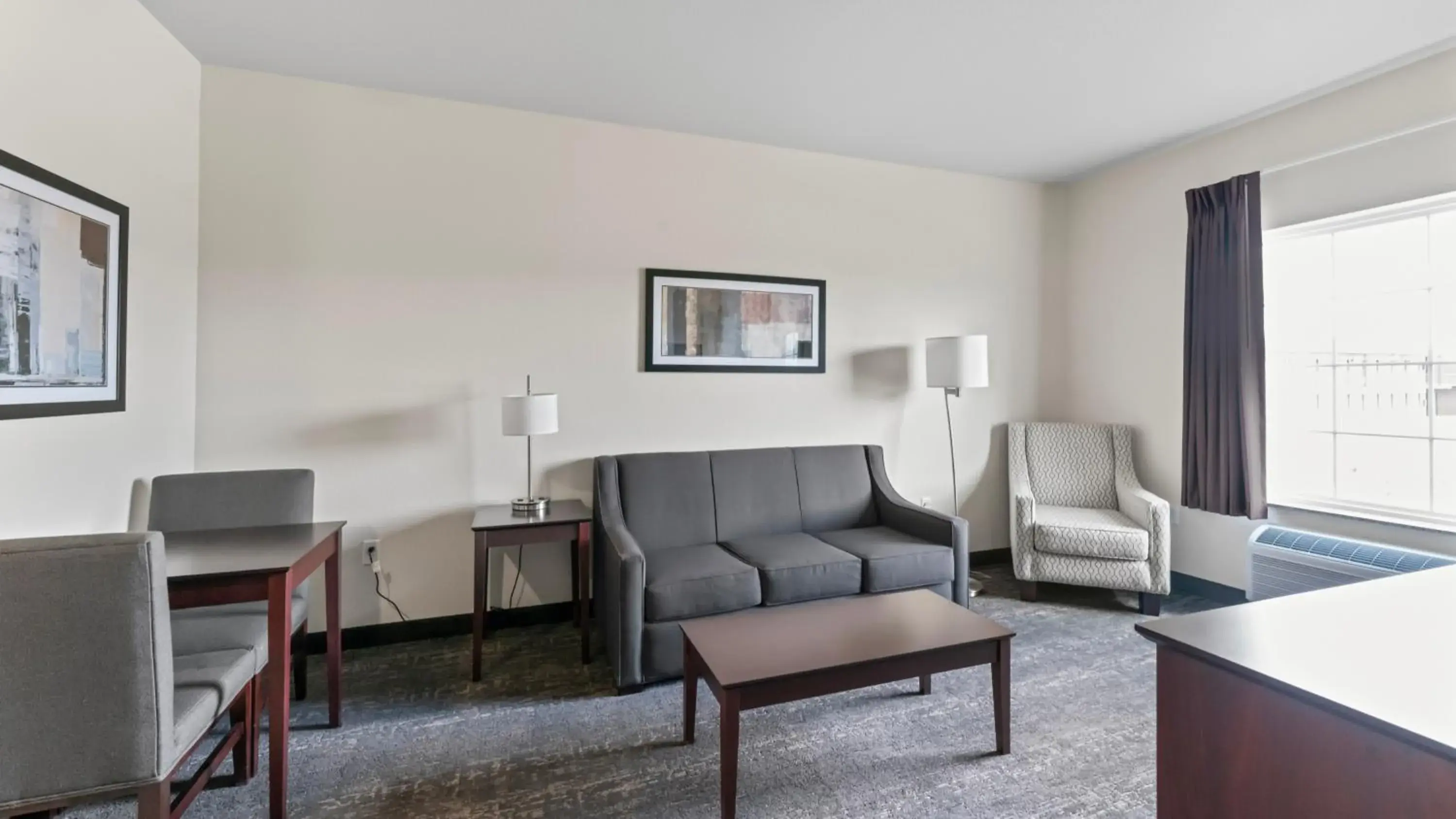 Living room in Cobblestone Inn & Suites - Julesburg Living room in Cobblestone Inn & Suites - Julesburg