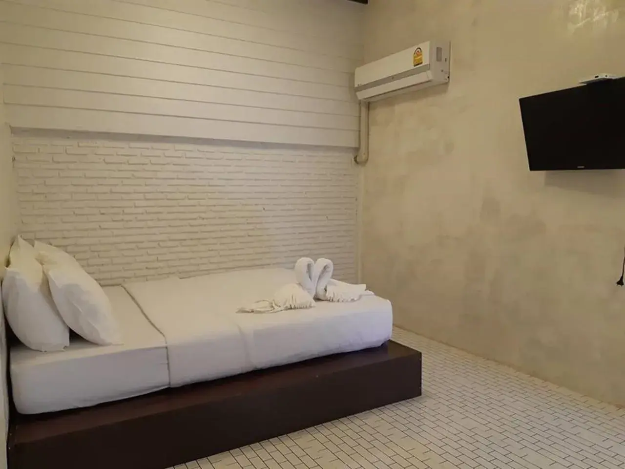 Bed in BaanChompooAmphawa Bed in BaanChompooAmphawa