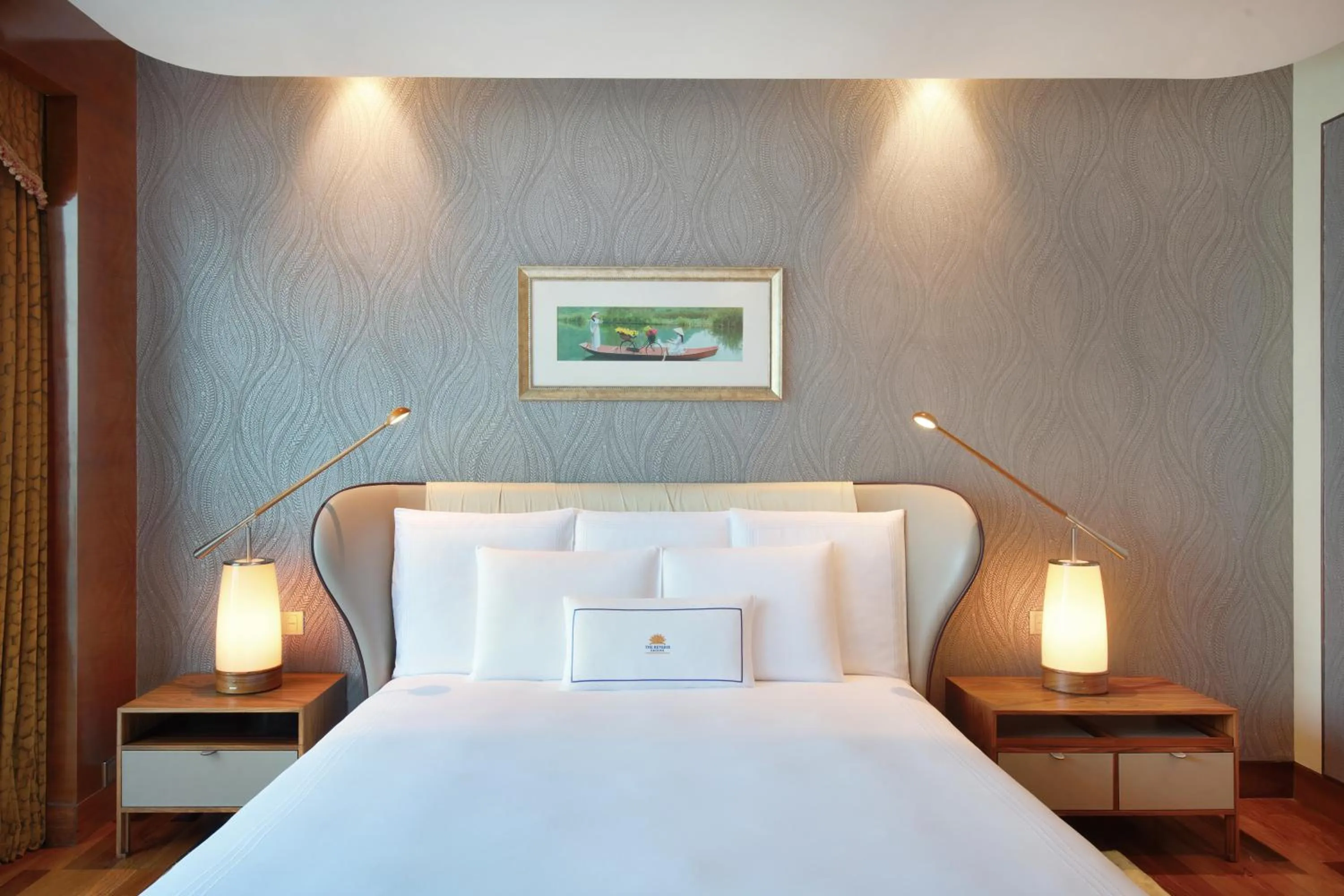 Bed in The Reverie Saigon