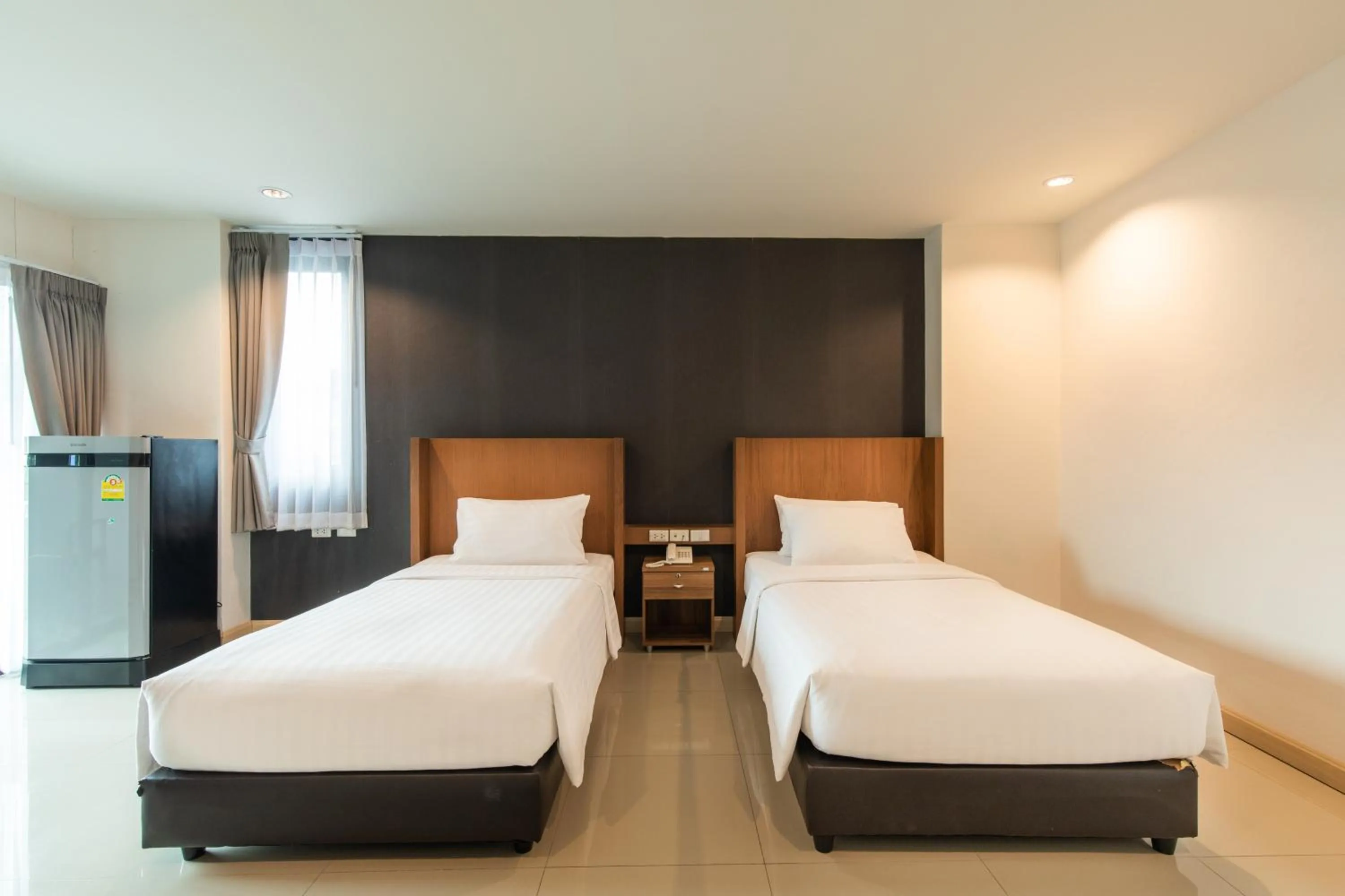 Bed in Jira Boutique Residence