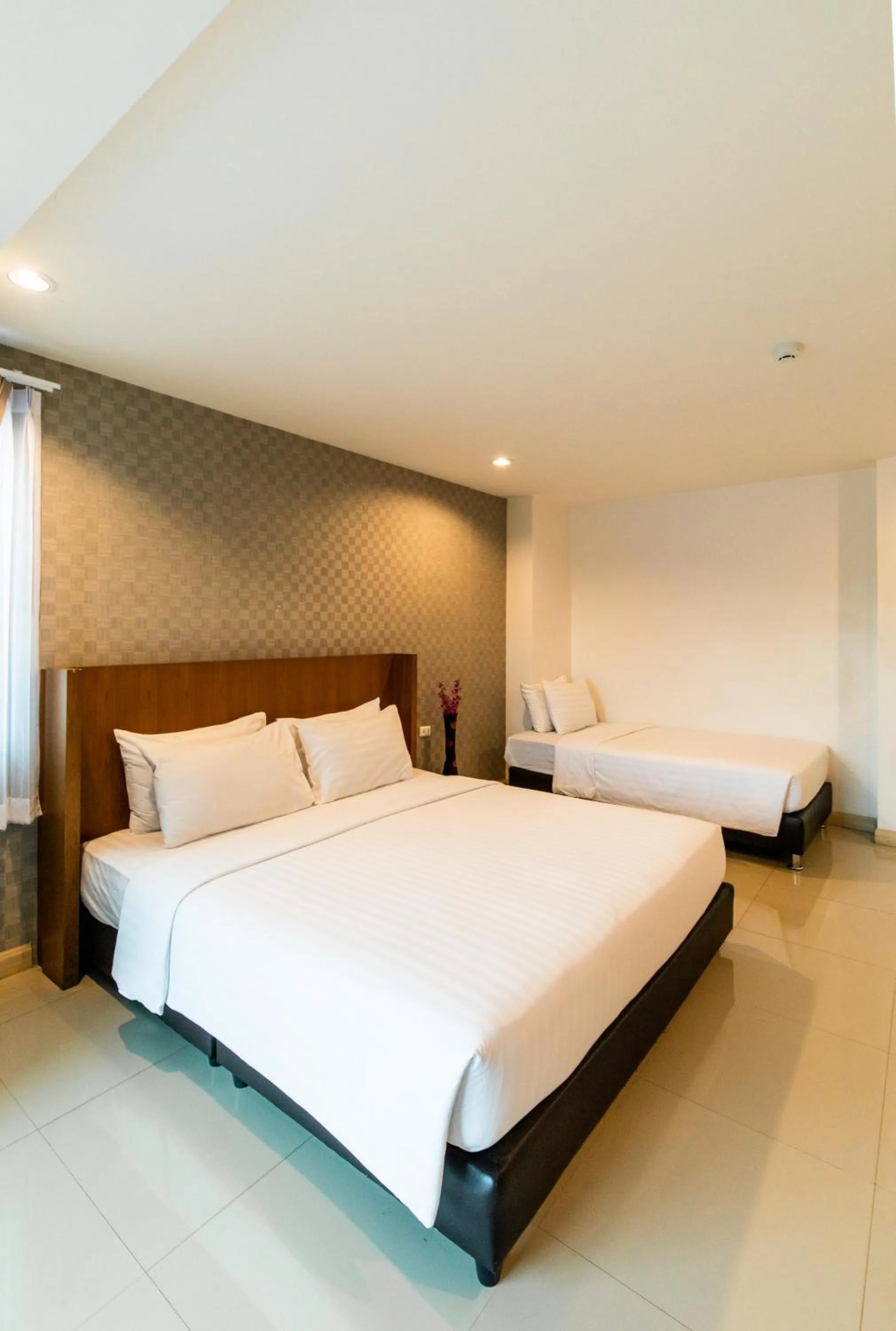 Bed in Jira Boutique Residence