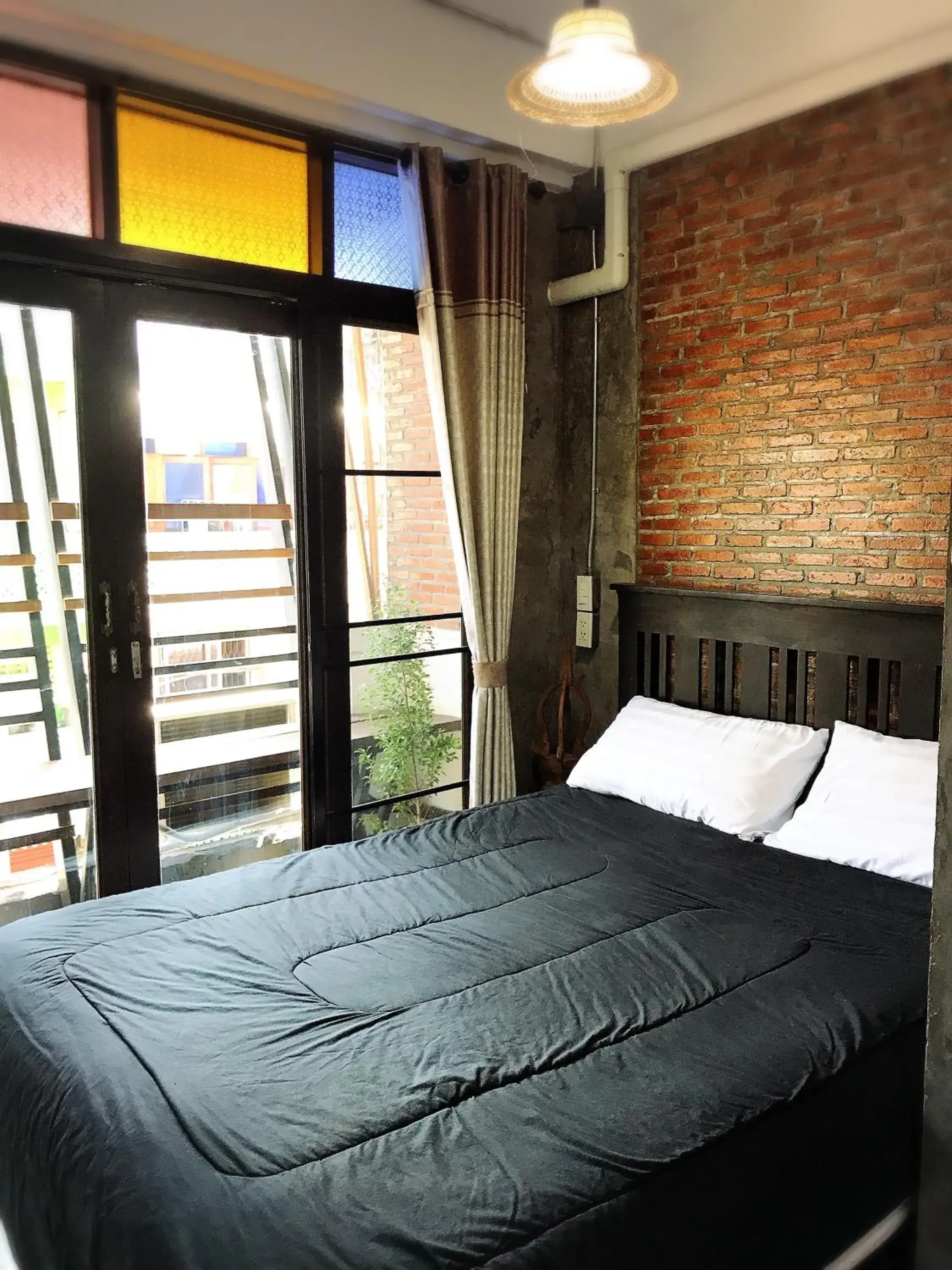 Queen Room with Balcony and Air Conditioning in Lanna Hostel Queen Room with Balcony and Air Conditioning in Lanna Hostel