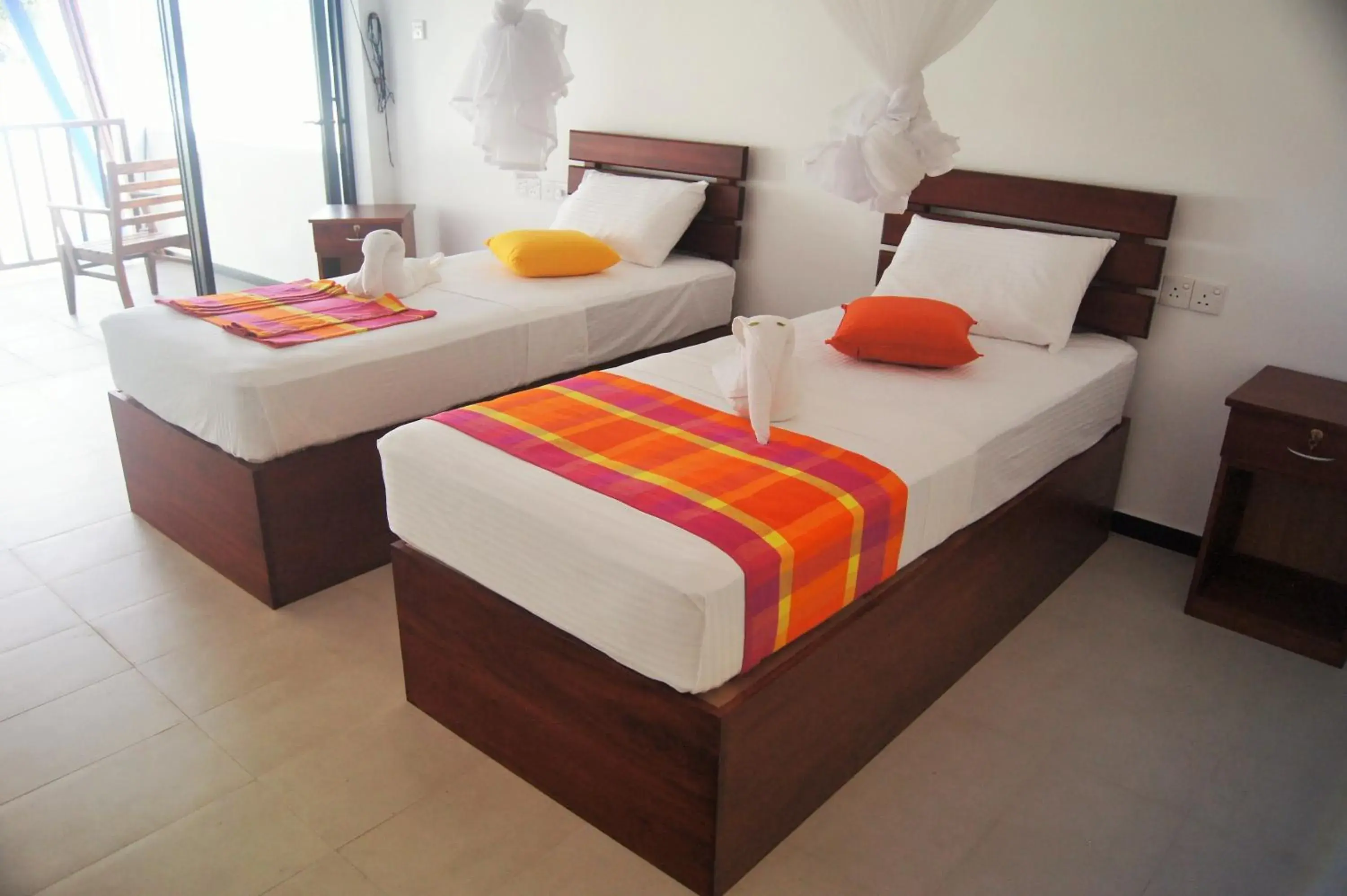 Deluxe Twin Room with Balcony and Sea View Air-con - single occupancy in Wellé Wadiya Beach Villa Deluxe Twin Room with Balcony and Sea View Air-con - single occupancy in Wellé Wadiya Beach Villa