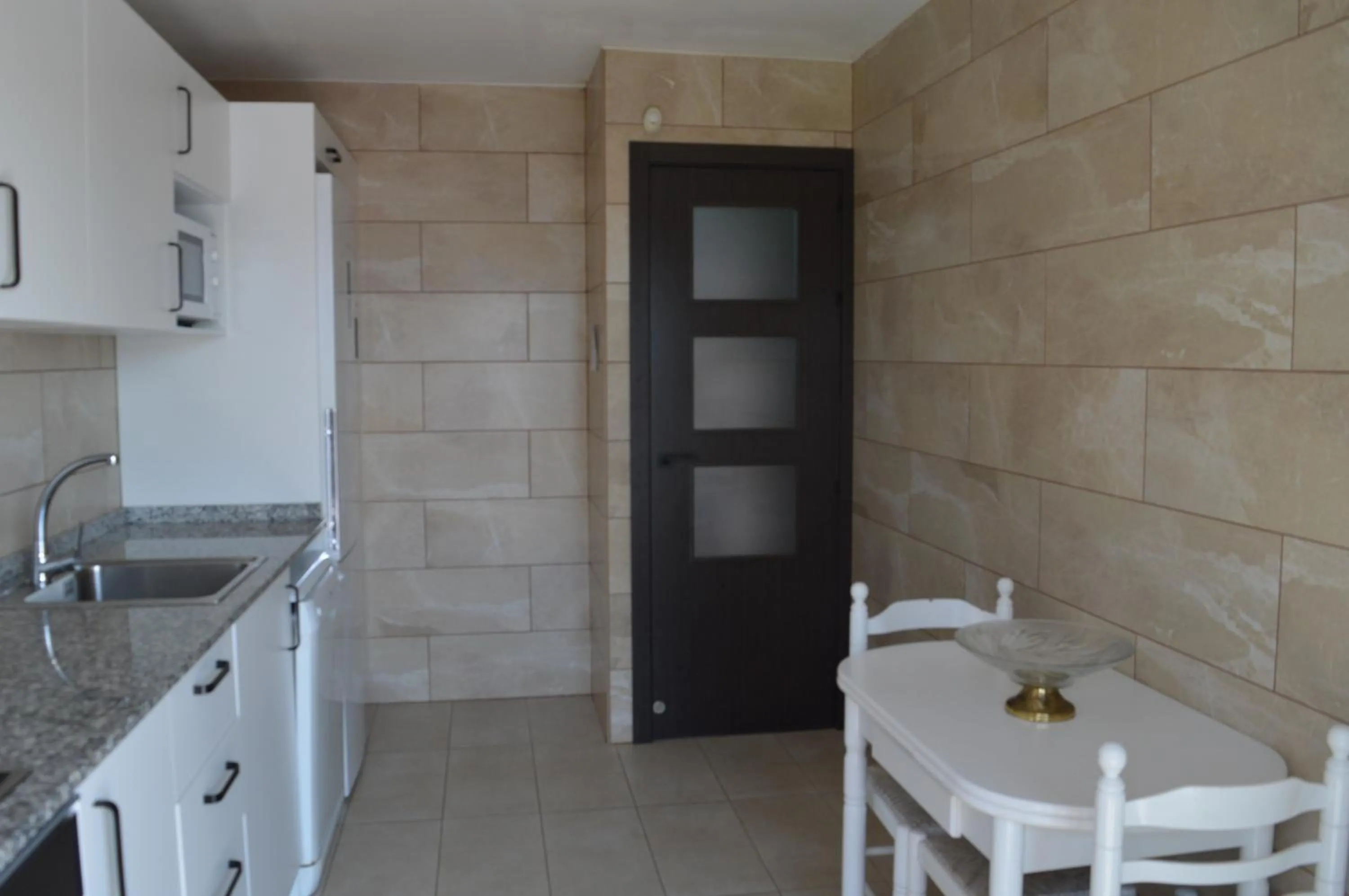 Kitchen or kitchenette in Villa Lagem