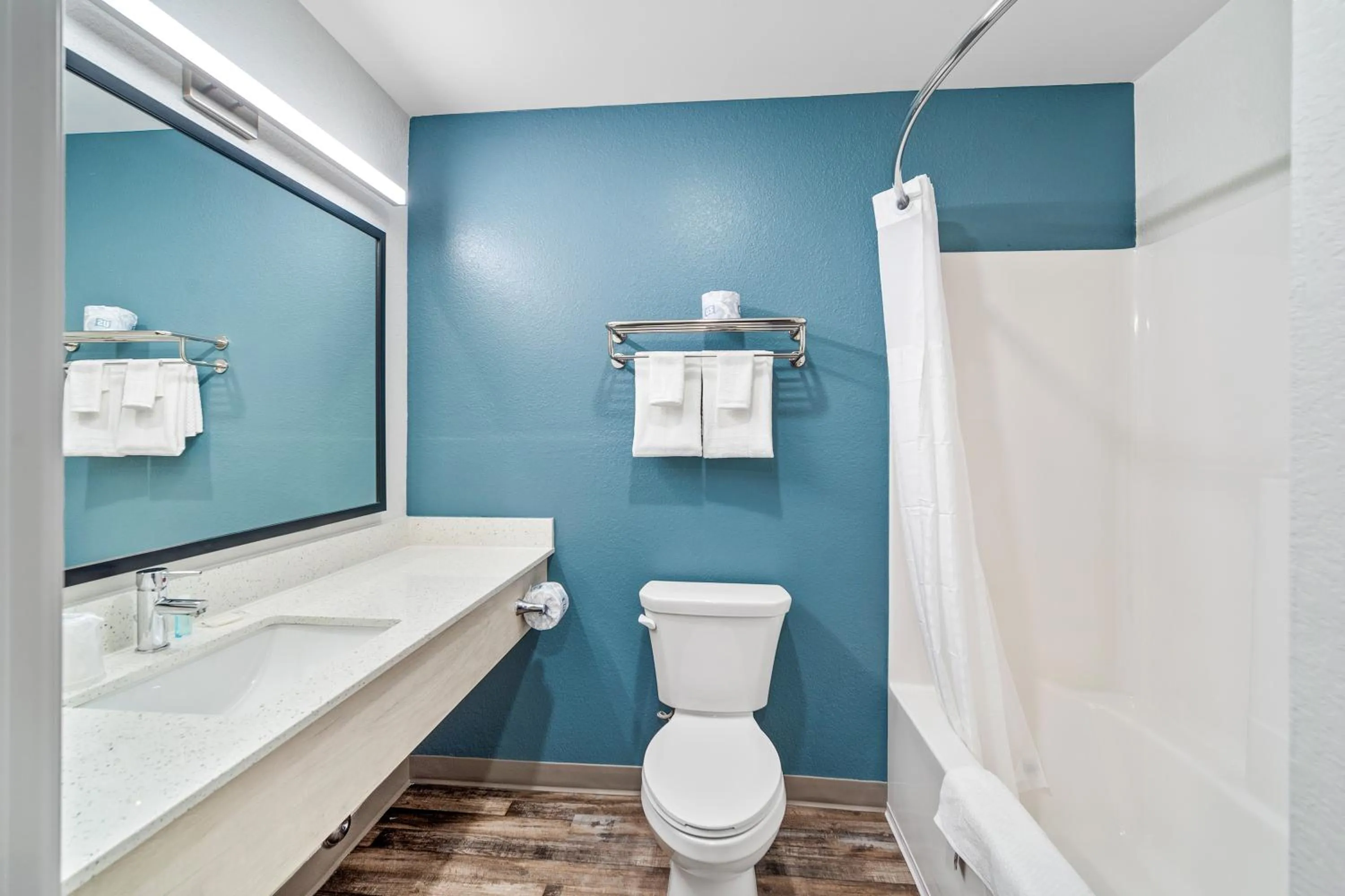 Bathroom in WoodSpring Suites Winston-Salem near Hanes Mall