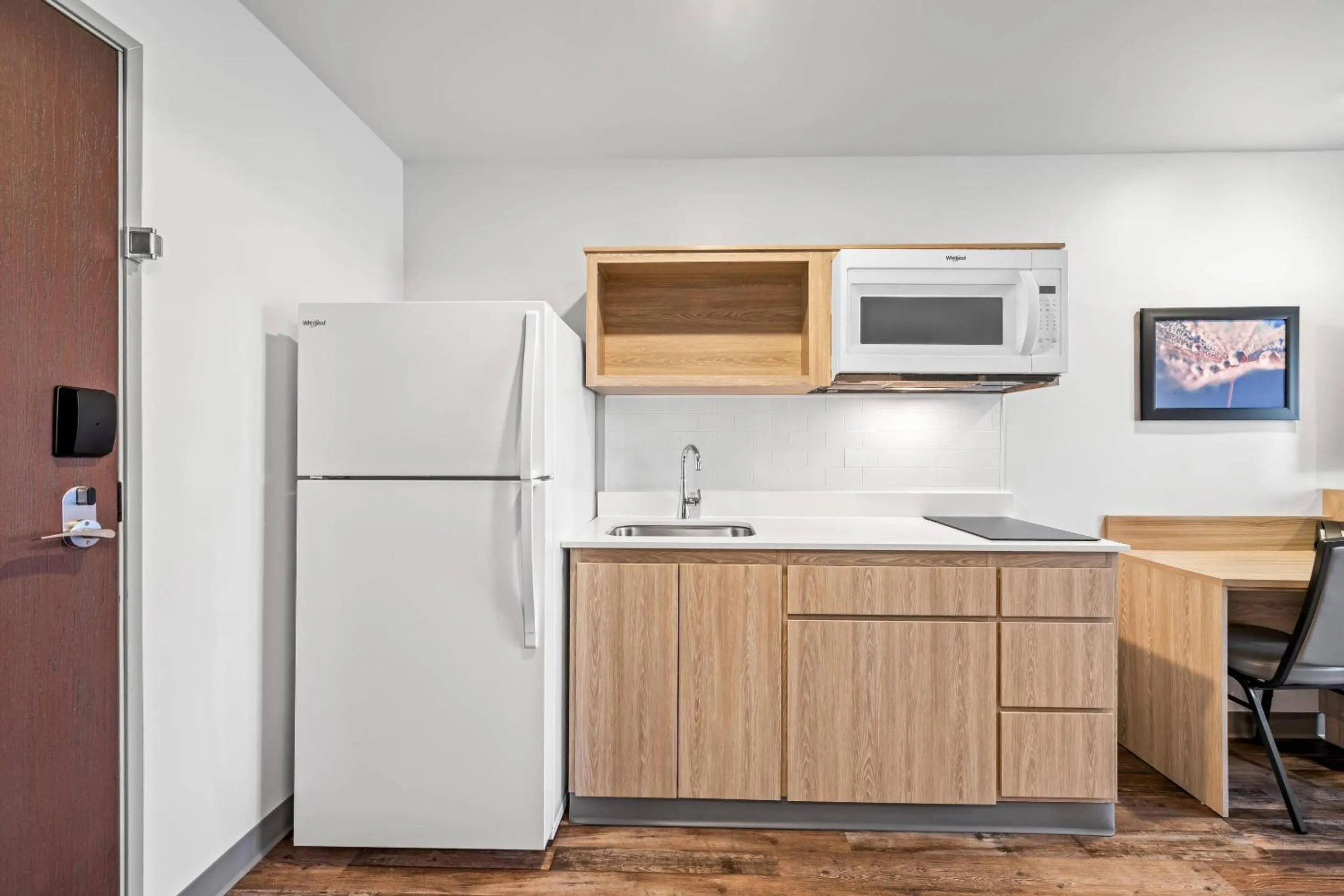 Bedroom in WoodSpring Suites Winston-Salem near Hanes Mall