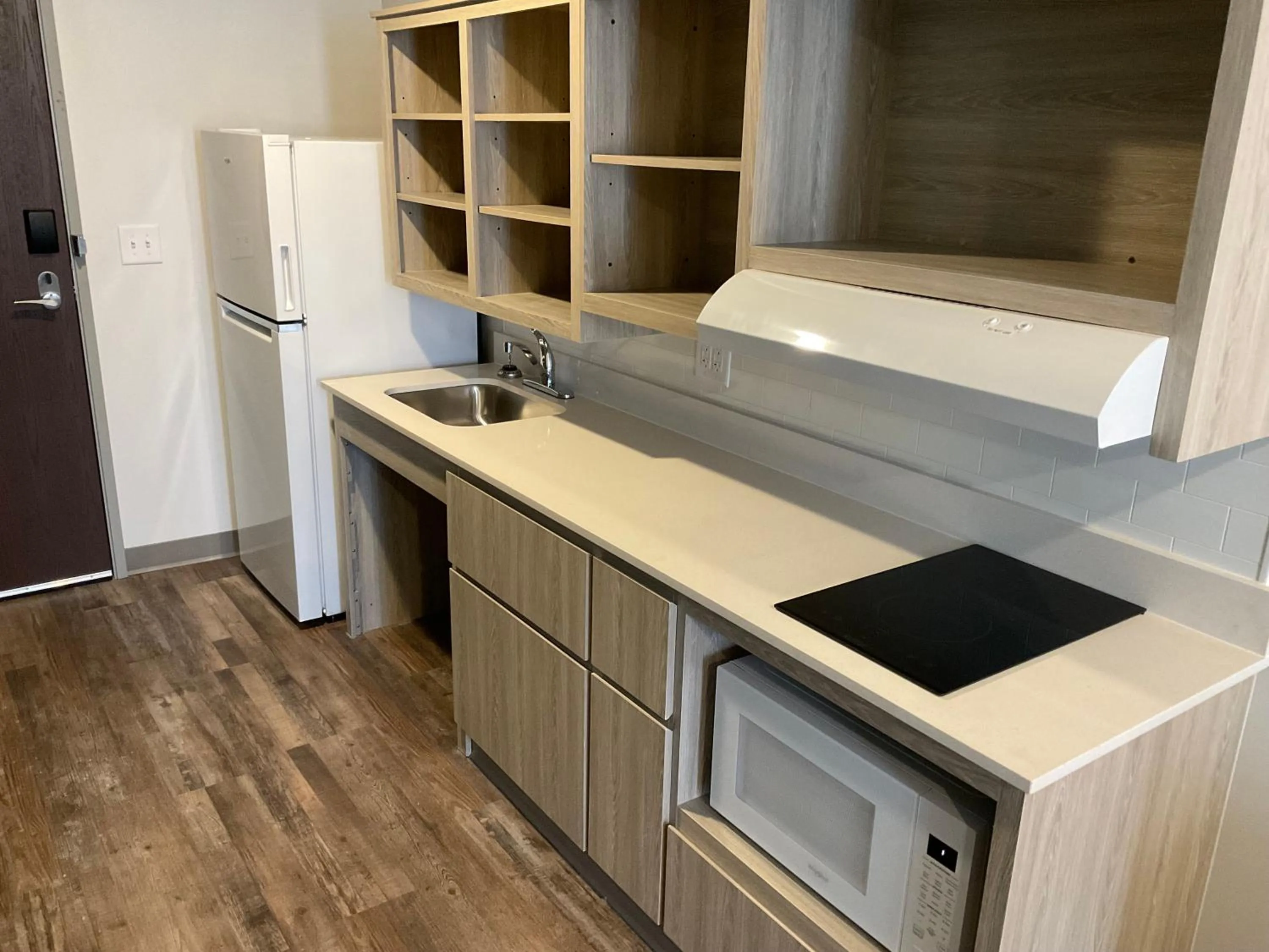 kitchen in WoodSpring Suites Winston-Salem near Hanes Mall