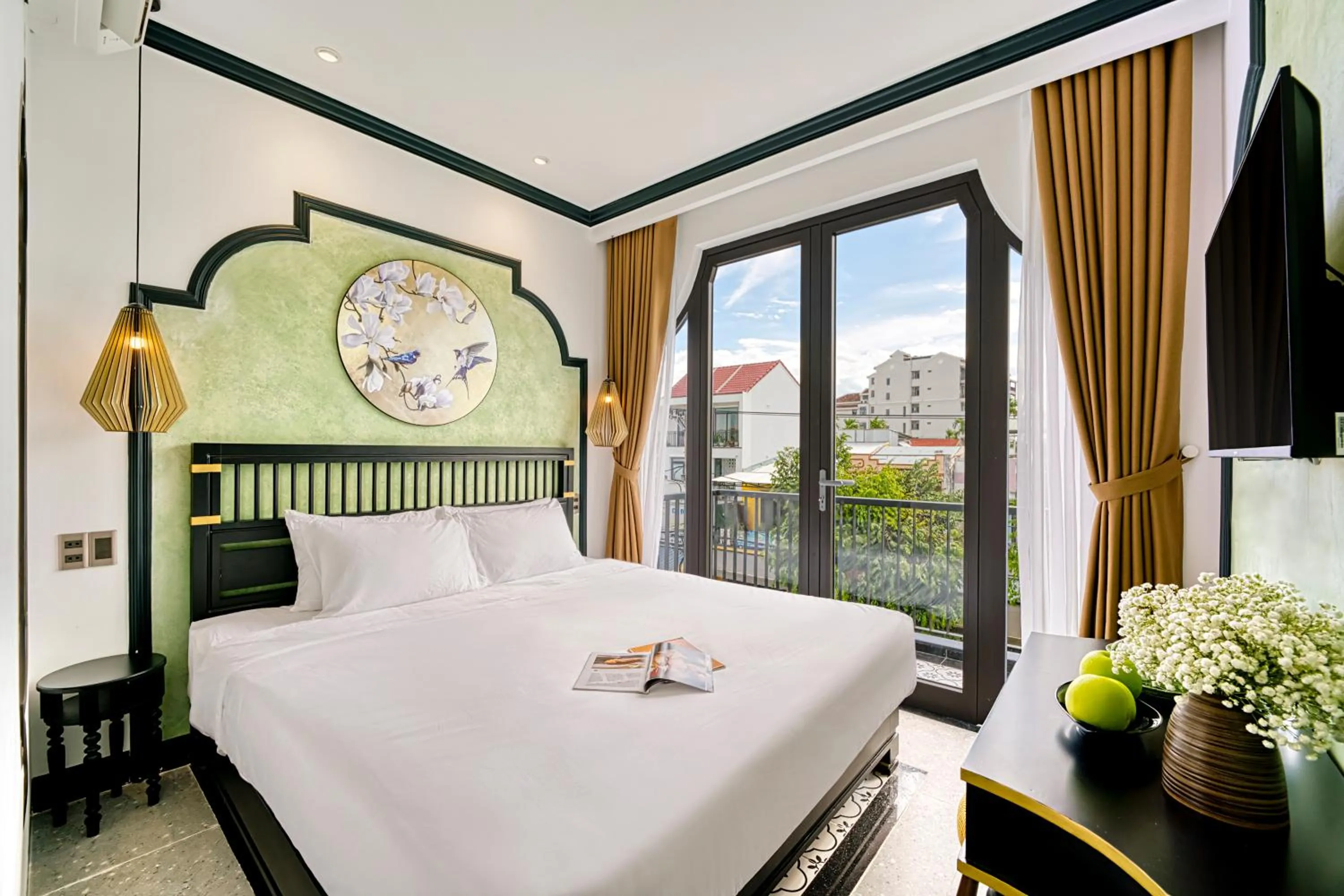 Bed in Rokas Hoi An Boutique Hotel