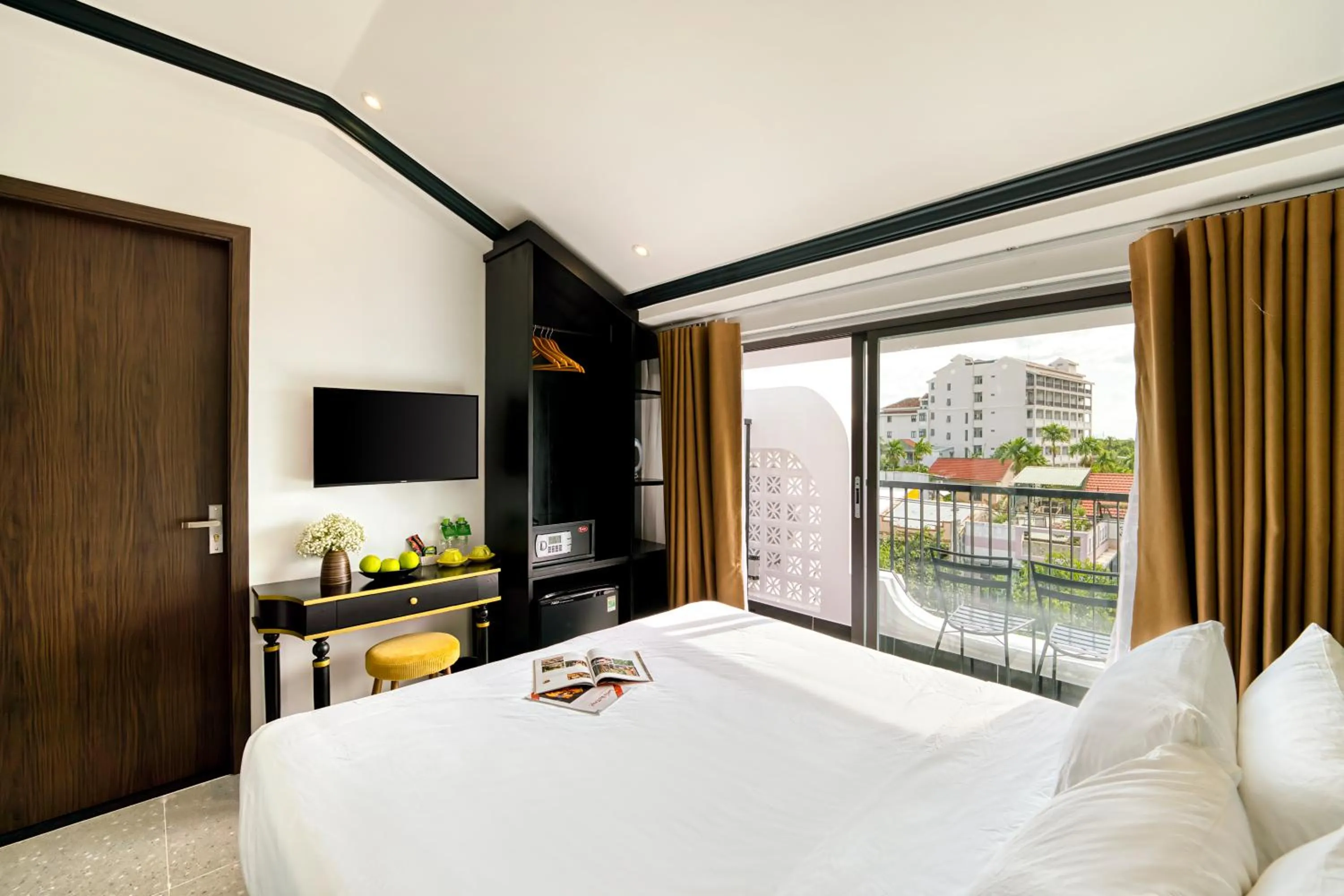 Bed in Rokas Hoi An Boutique Hotel