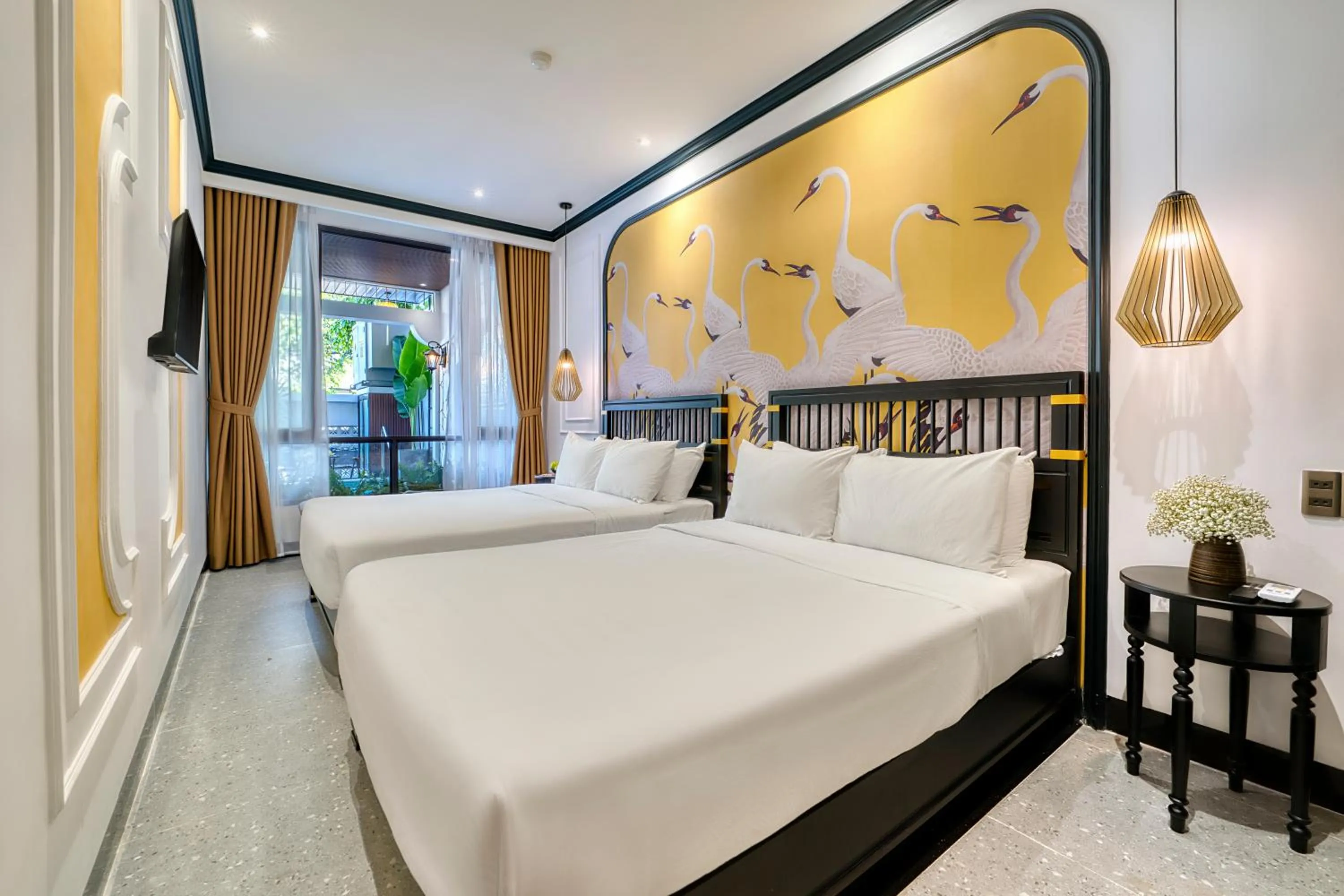 Bed in Rokas Hoi An Boutique Hotel