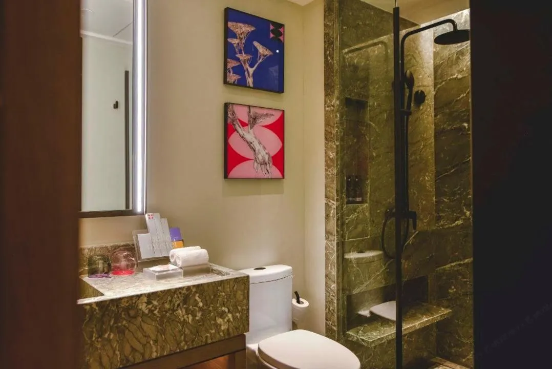 Shower in MUSTEL Hotel Guangzhou Nansha