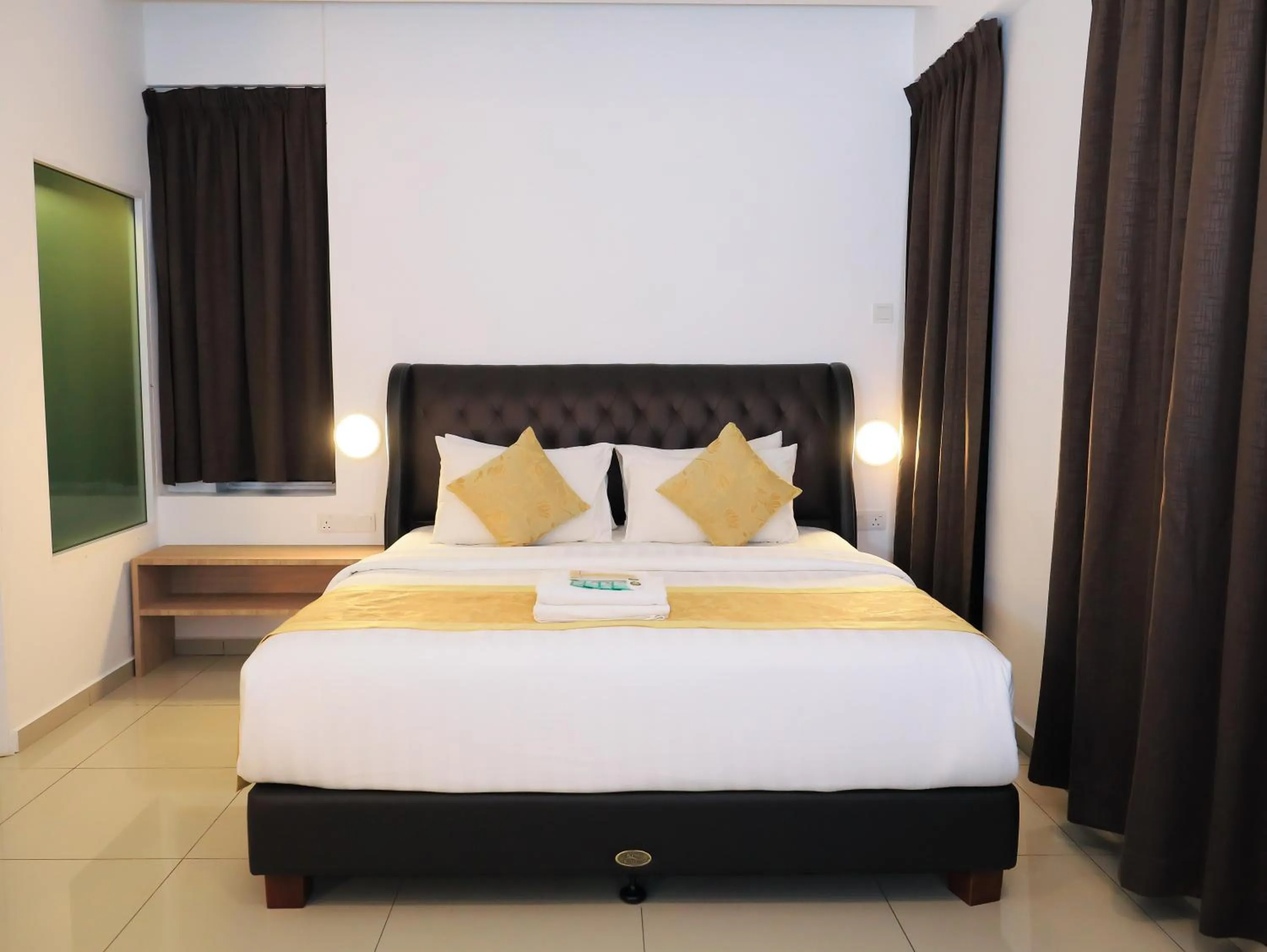 Bed in BIG TREE HOTEL