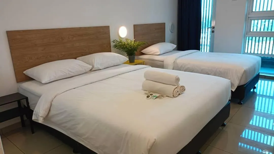 Bed in BIG TREE HOTEL