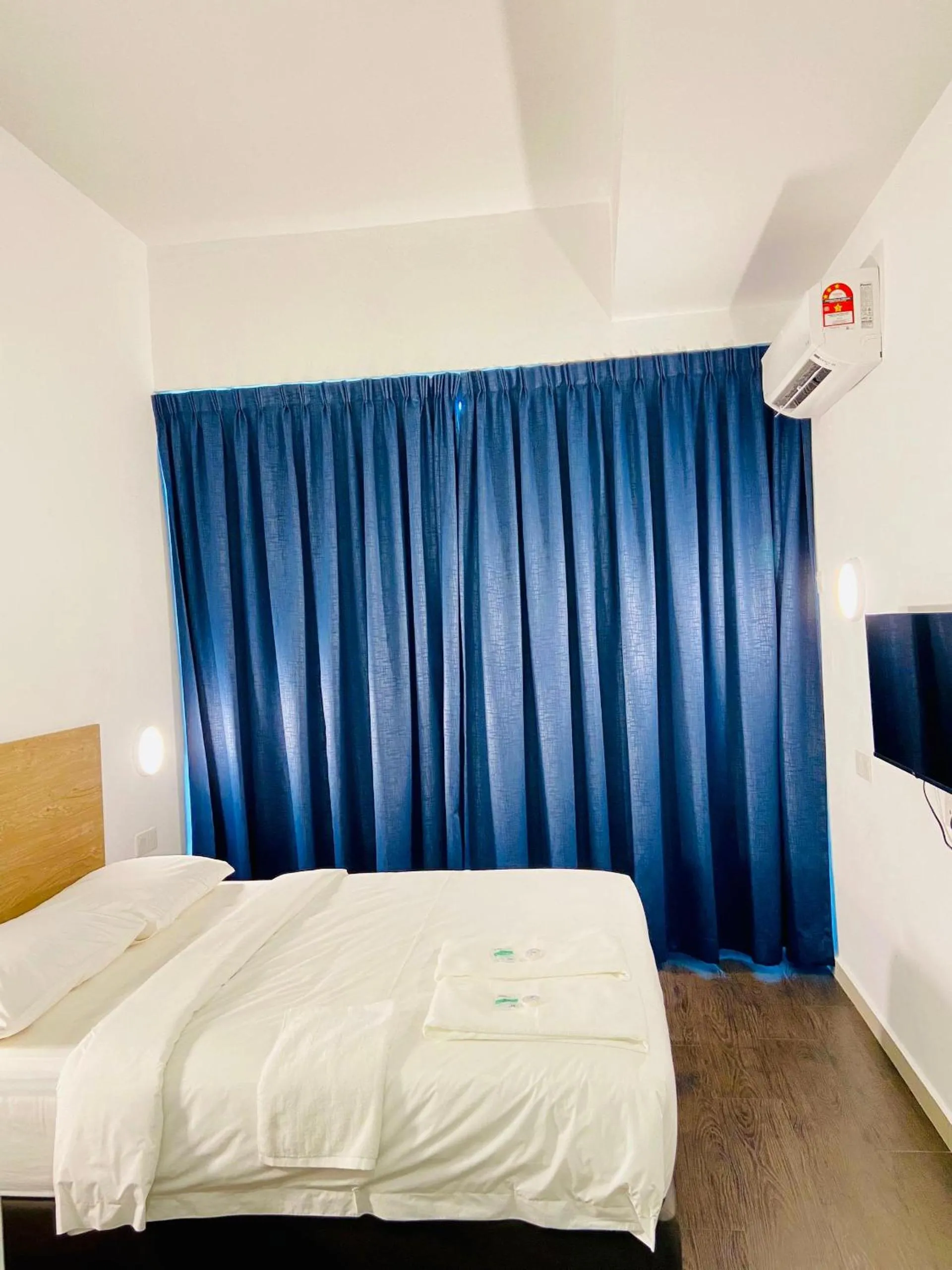 Bed in BIG TREE HOTEL