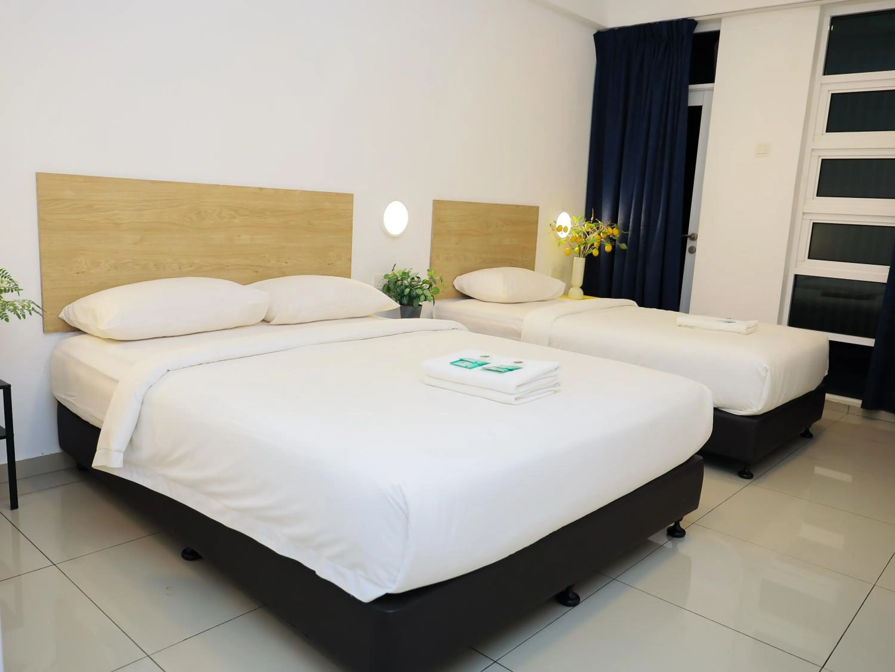 Bed in BIG TREE HOTEL