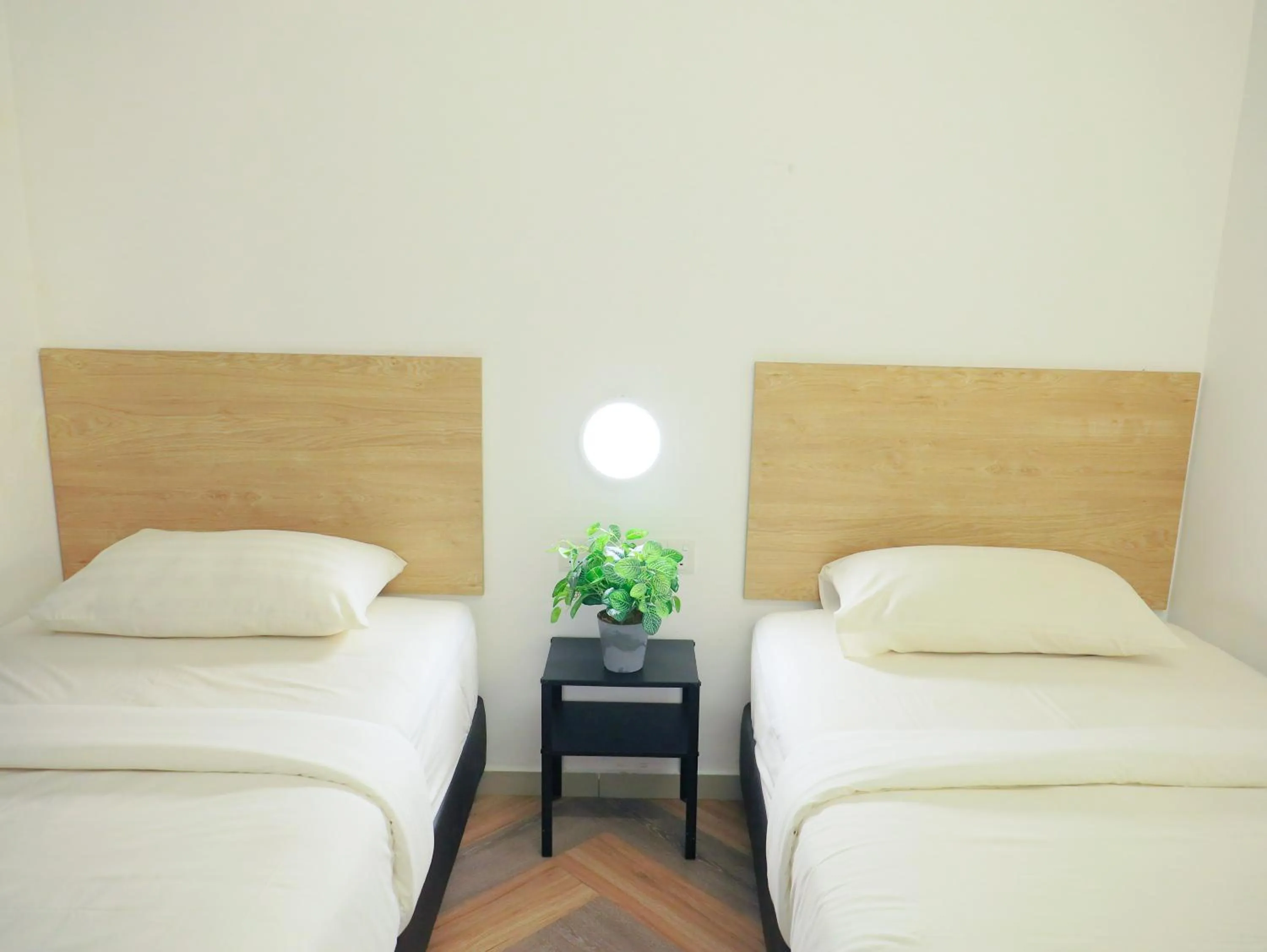 Bed in BIG TREE HOTEL