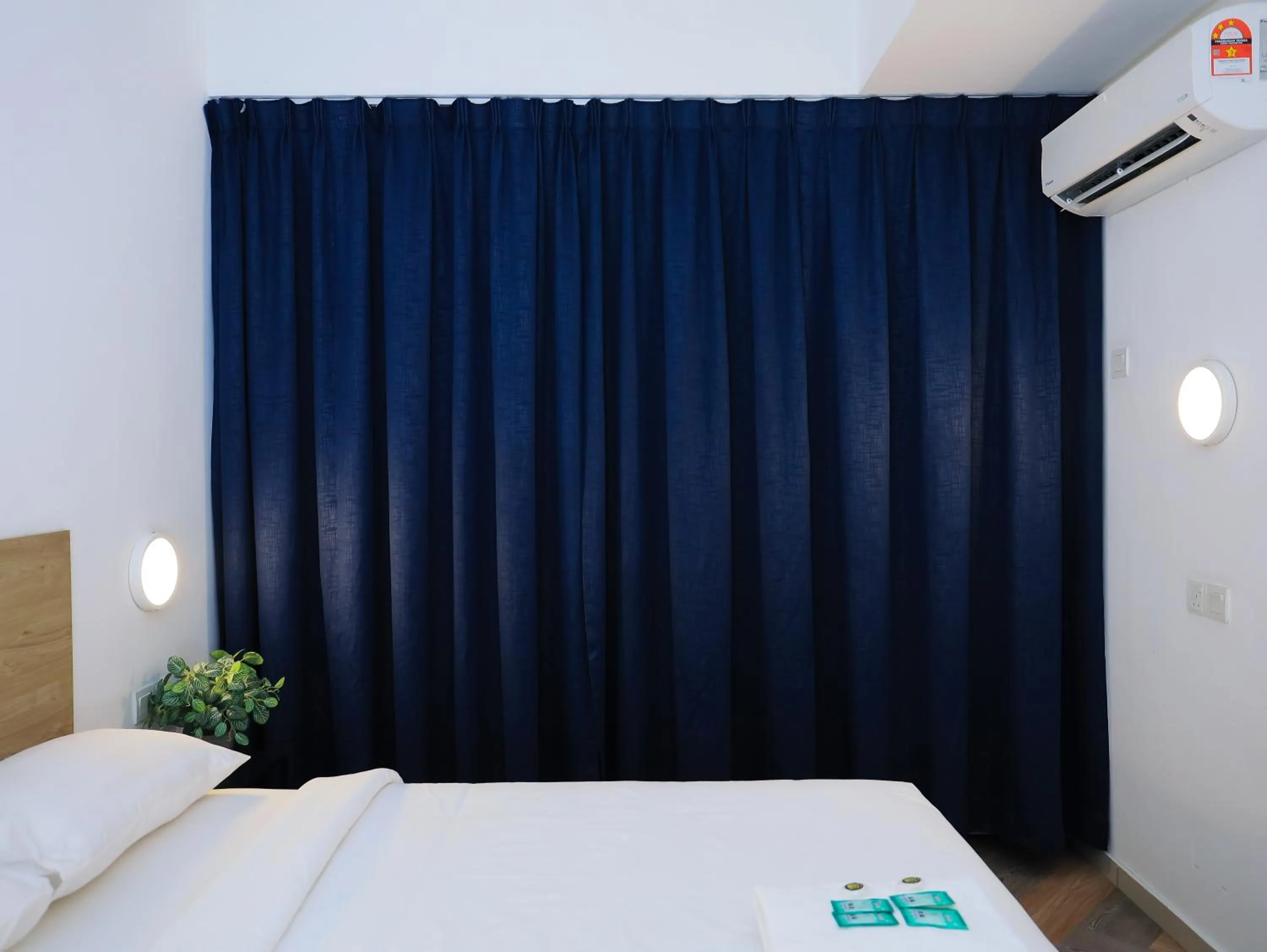 Bed in BIG TREE HOTEL