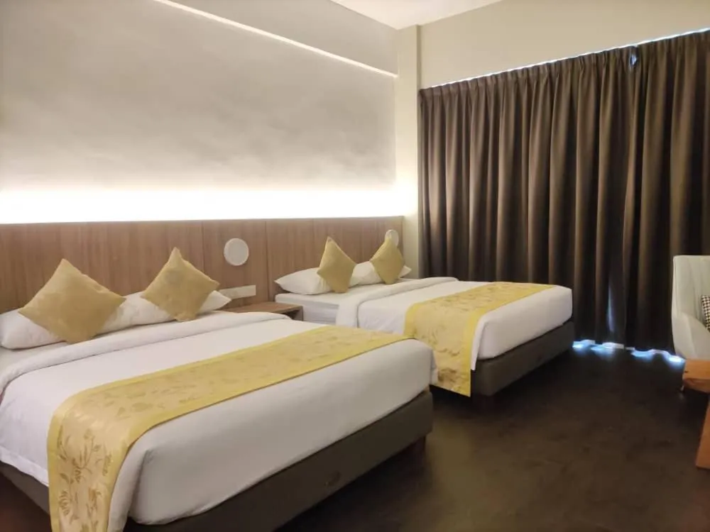 Bed in BIG TREE HOTEL