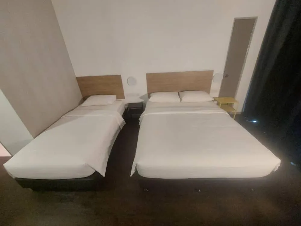 Bed in BIG TREE HOTEL