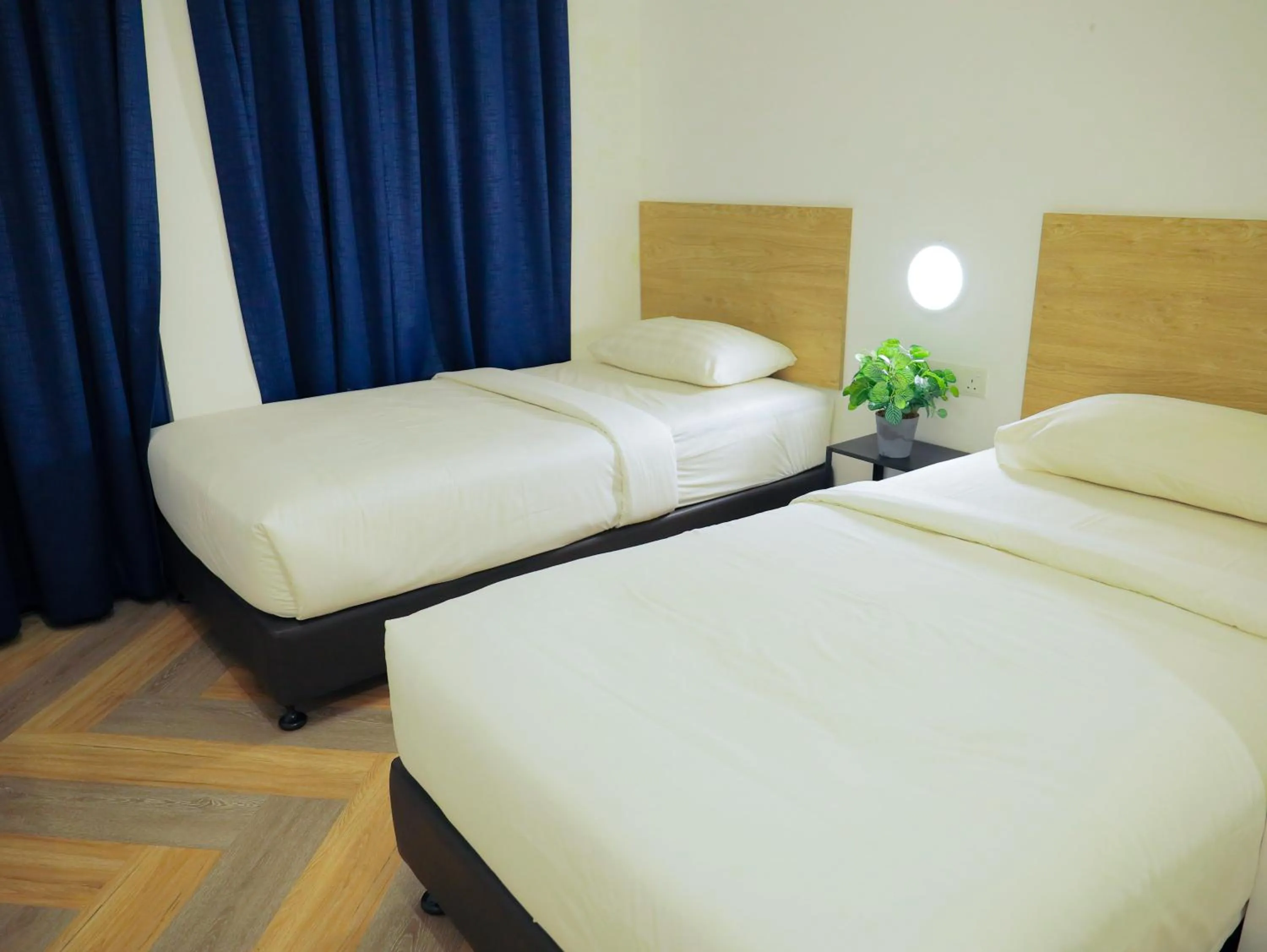 Bed in BIG TREE HOTEL