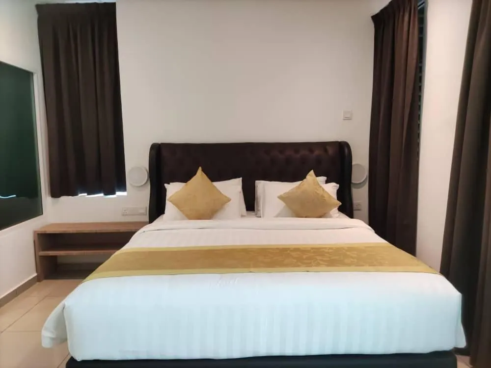 Bed in BIG TREE HOTEL