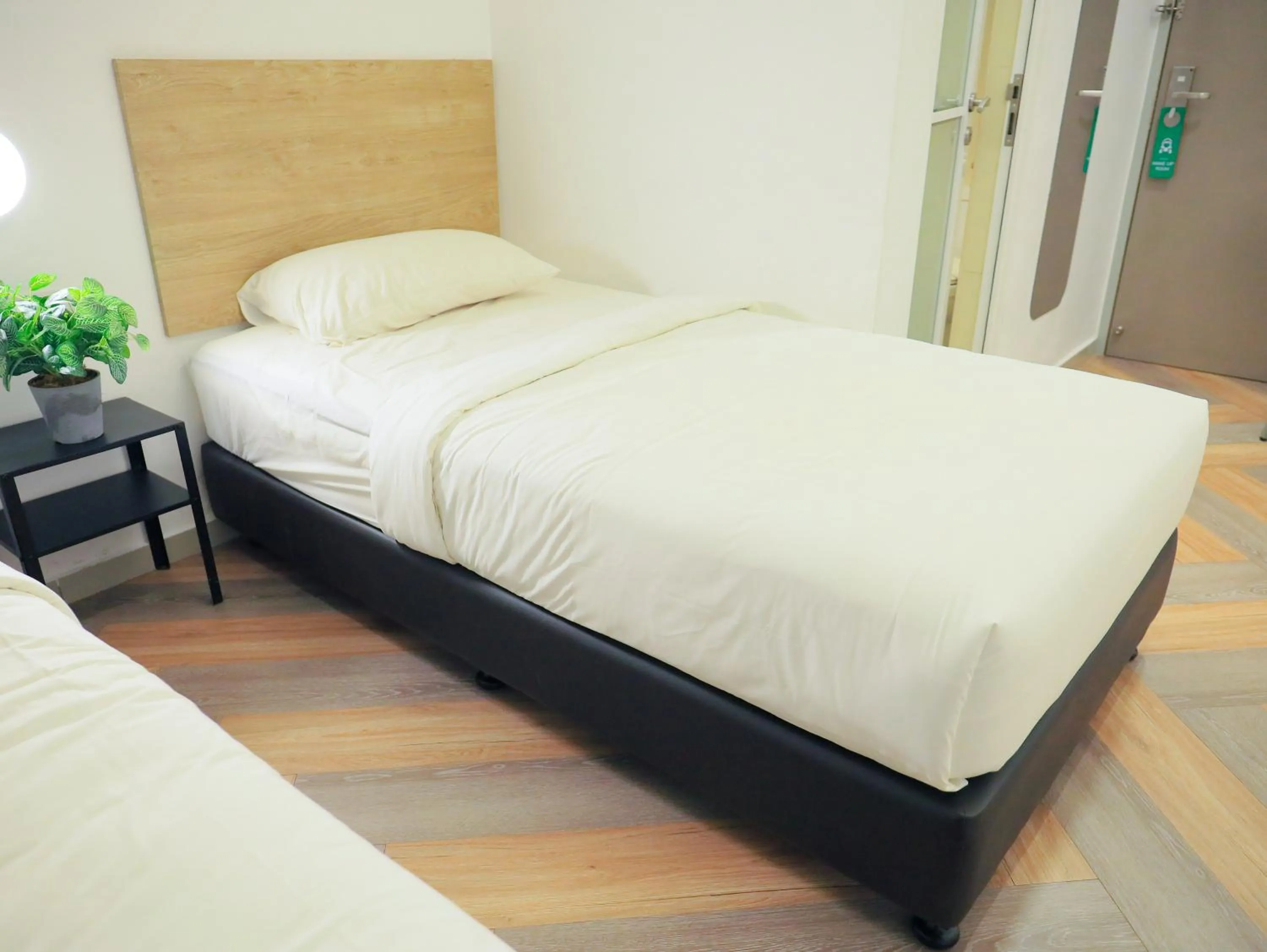 Bed in BIG TREE HOTEL