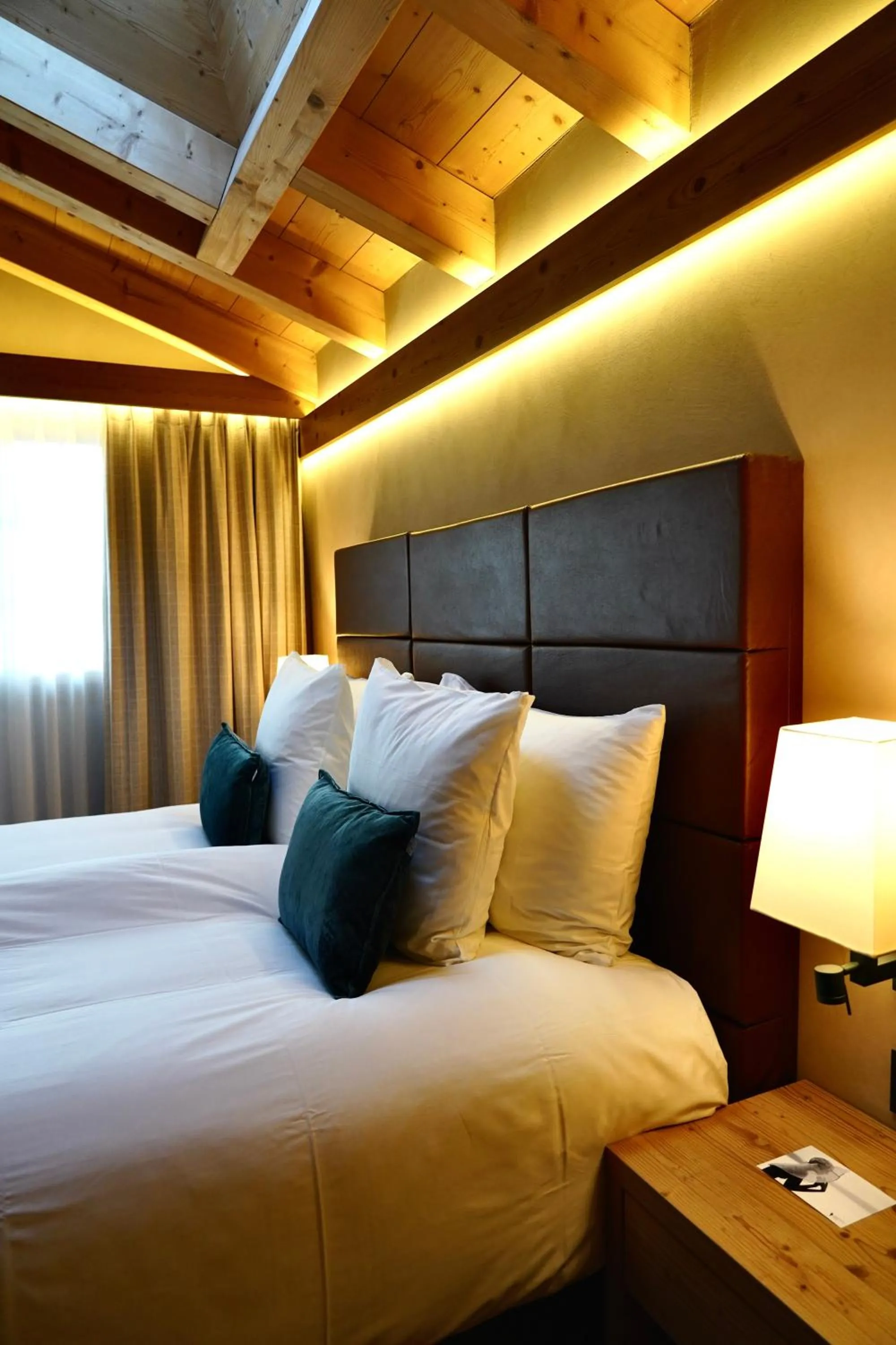 Bed in Hôtel de Rougemont & Spa