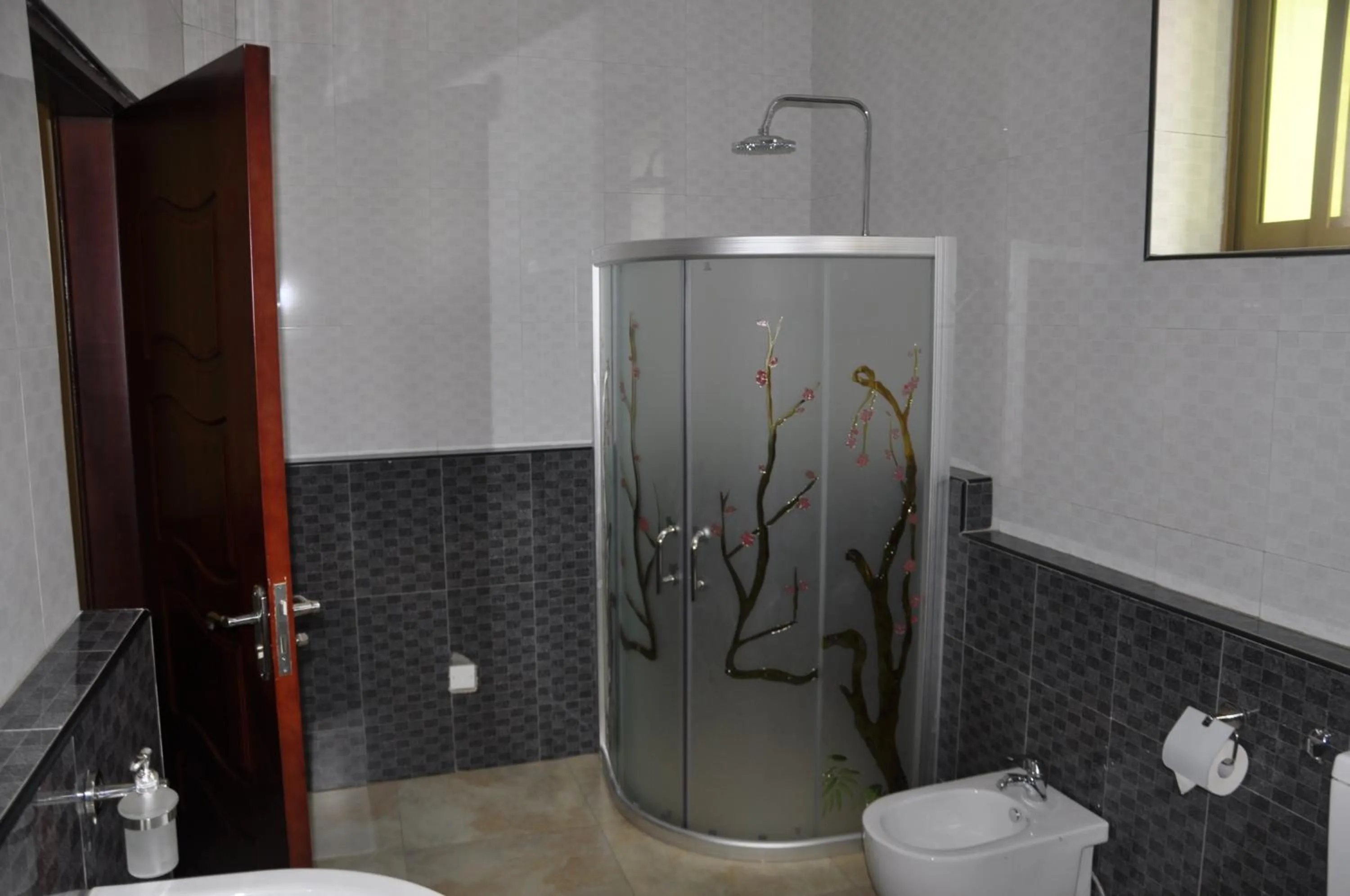 Bathroom in Biraj International Hotel