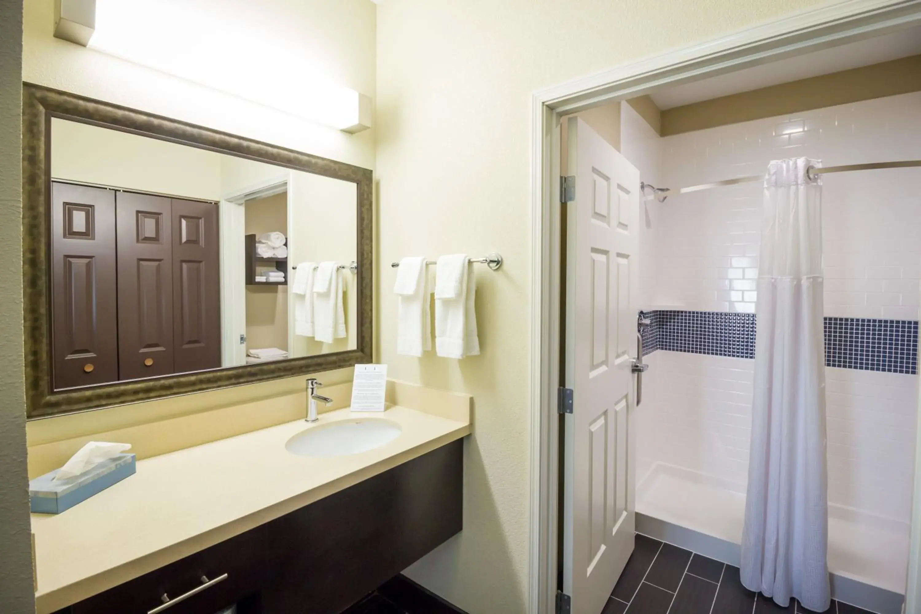 Bathroom in Staybridge Suites Plano - Legacy West Area by IHG Bathroom in Staybridge Suites Plano - Legacy West Area by IHG