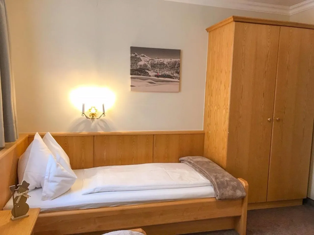 Bed in Andi's Skihotel