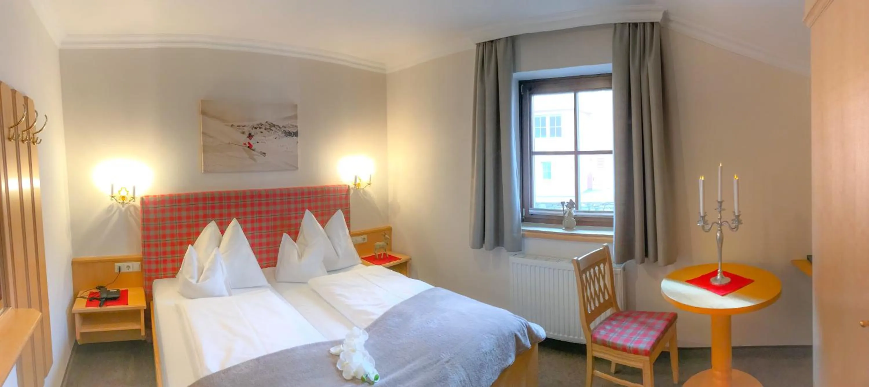 Bed in Andi's Skihotel