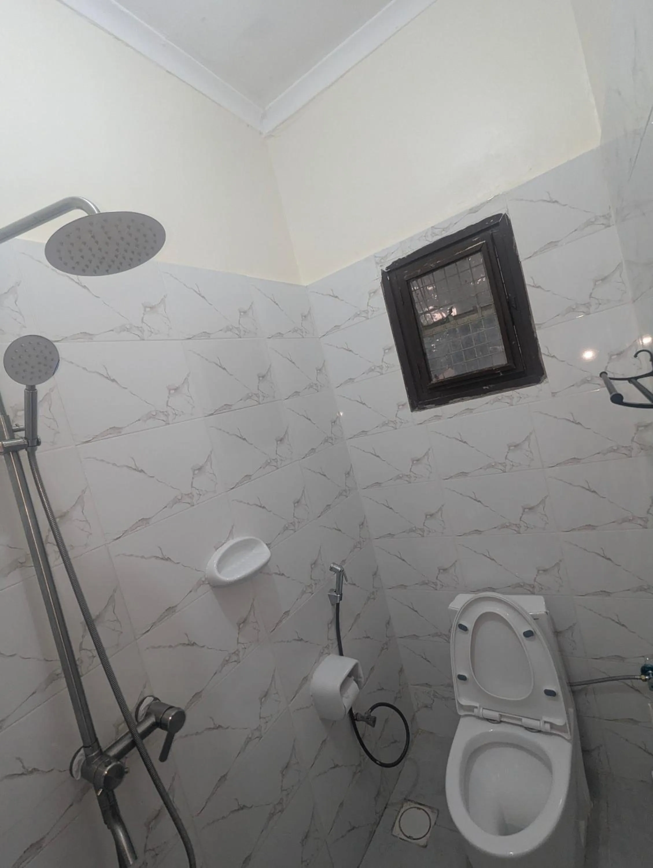 Shower in JACARANDA HOMESTAY