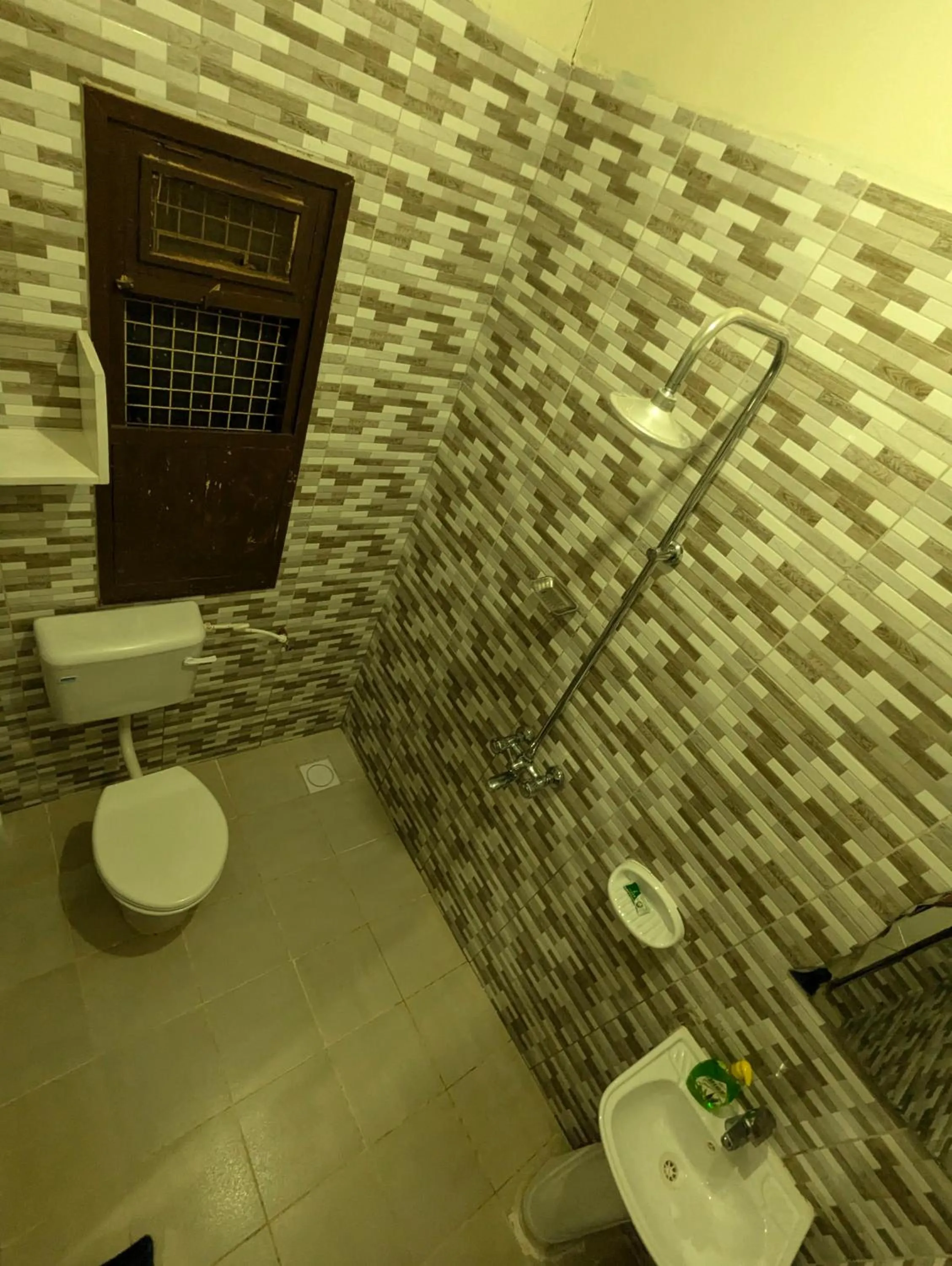 Shower in JACARANDA HOMESTAY