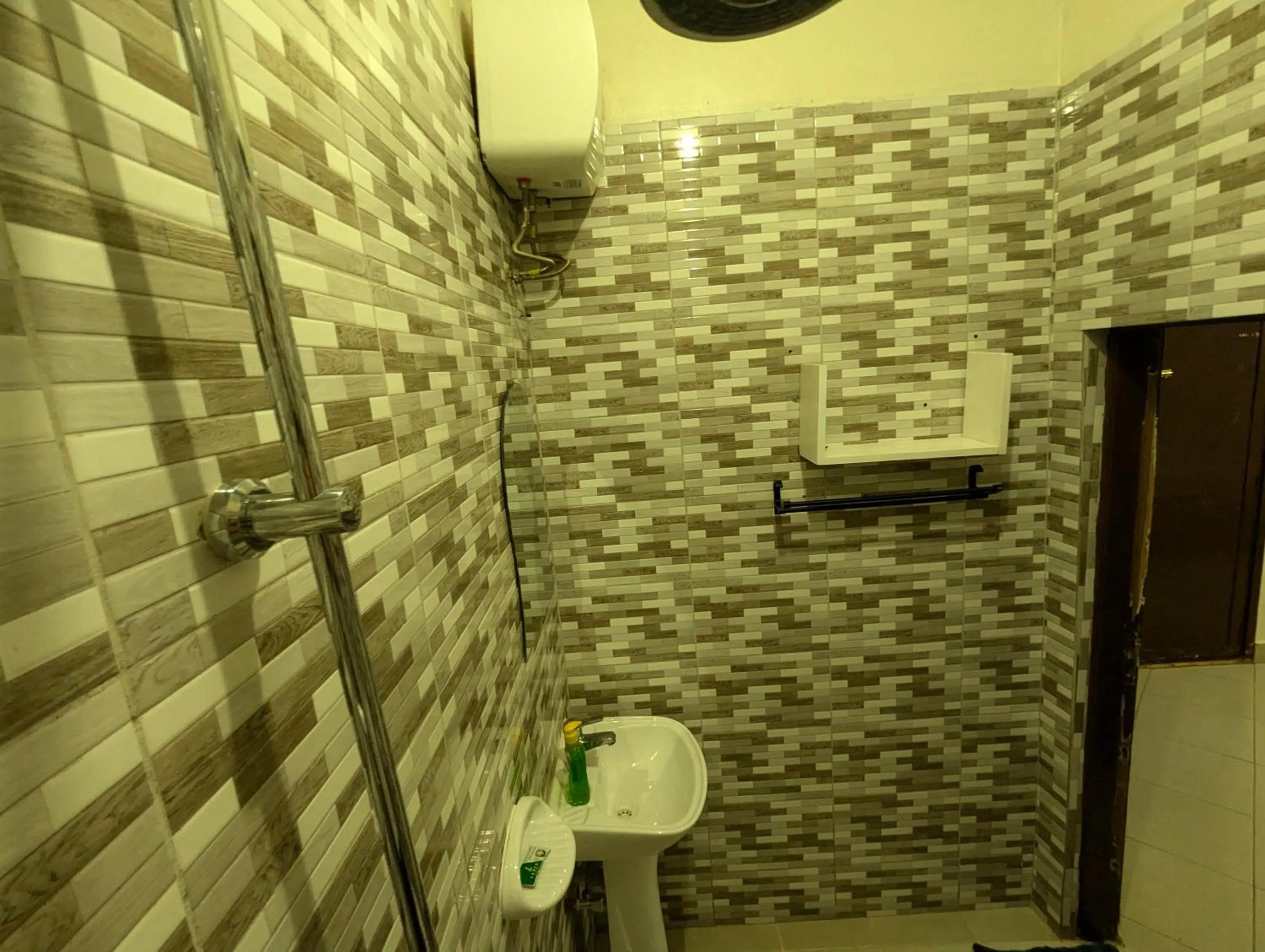 Shower in JACARANDA HOMESTAY