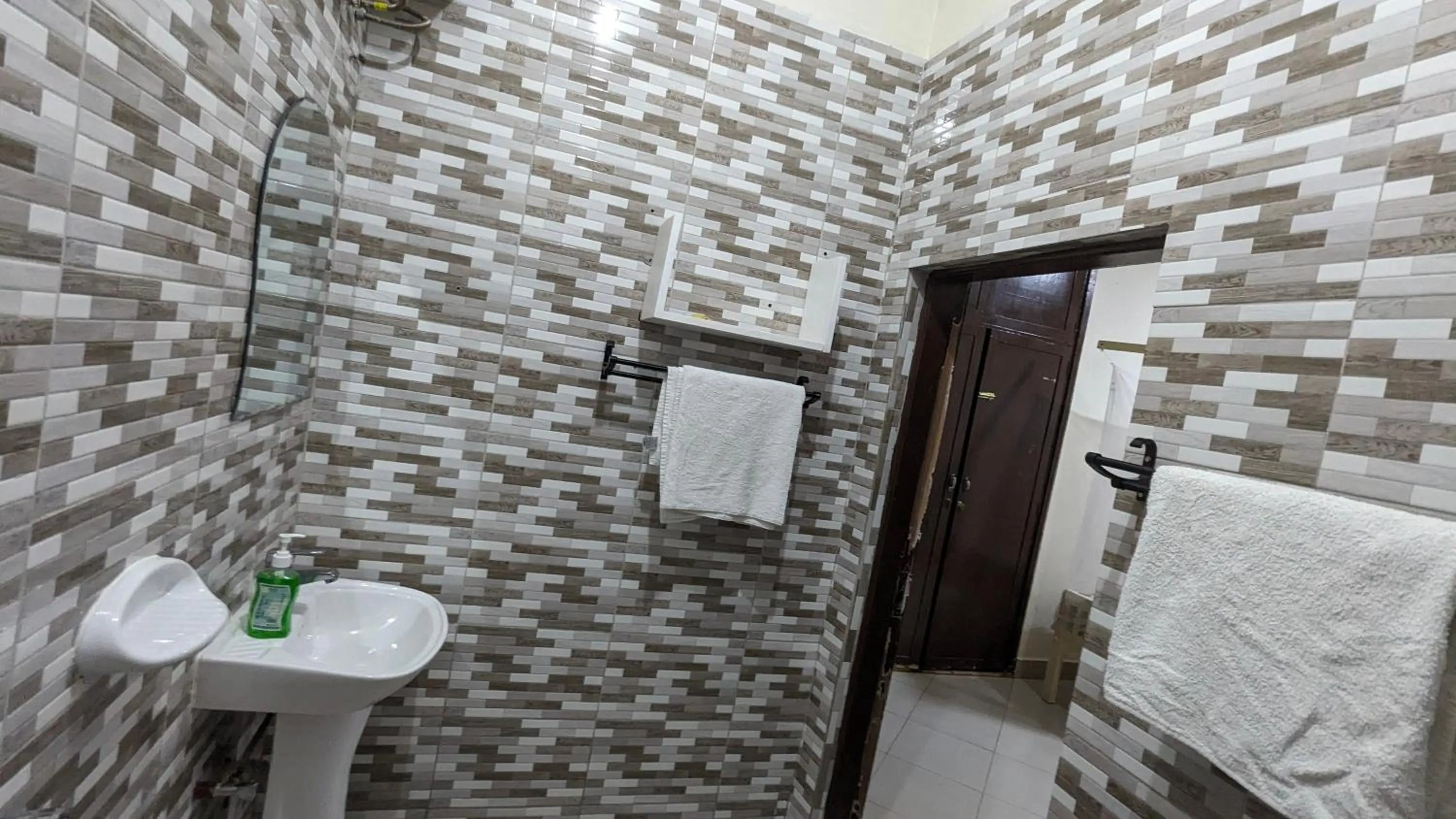 Shower in JACARANDA HOMESTAY