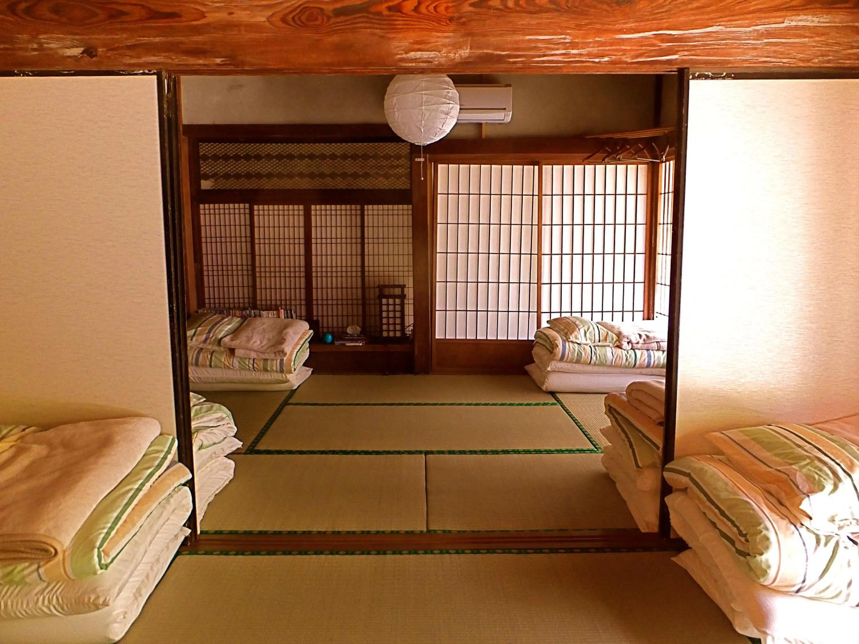 Bed in Kominka Sharehouse Hooju