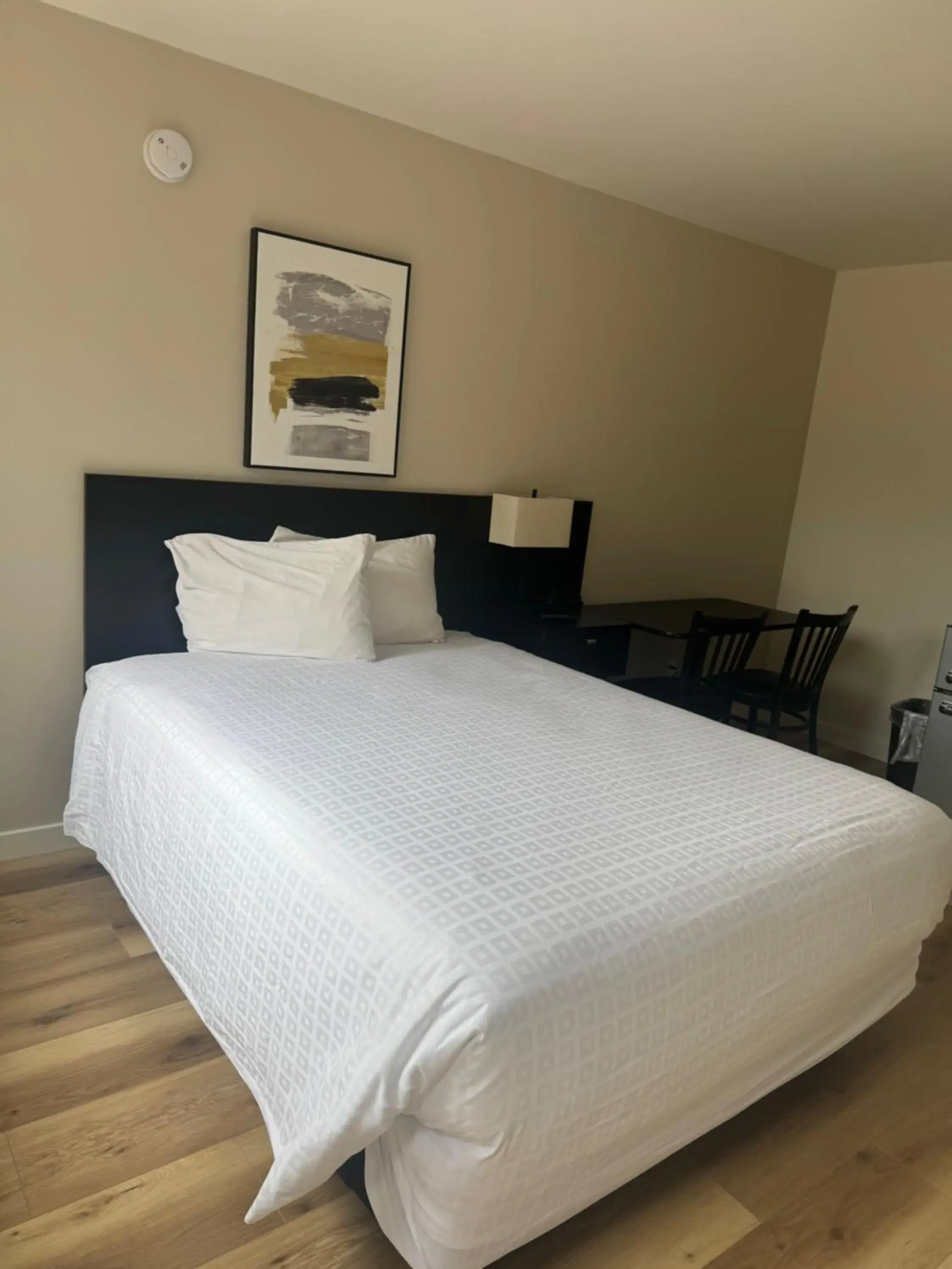 Bed in Richland Inn and Suites Bed in Richland Inn and Suites