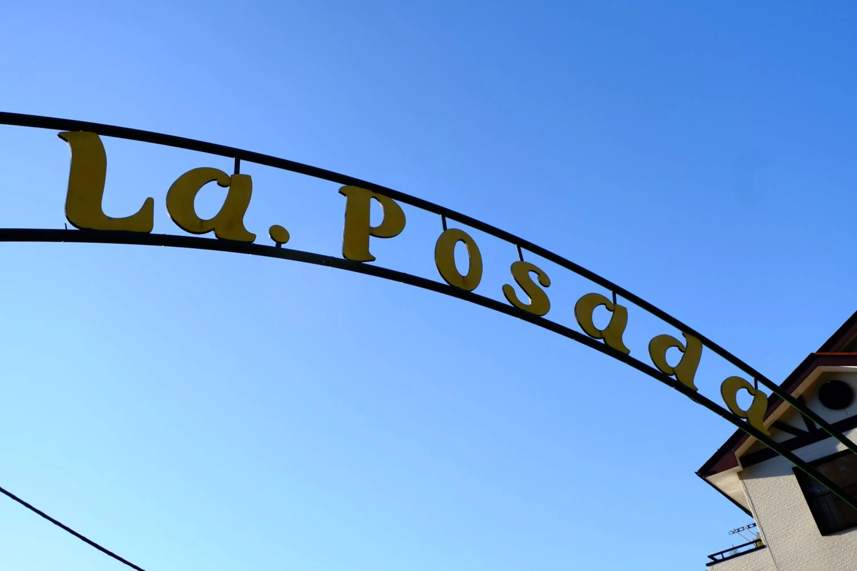 Property logo or sign in La Posada