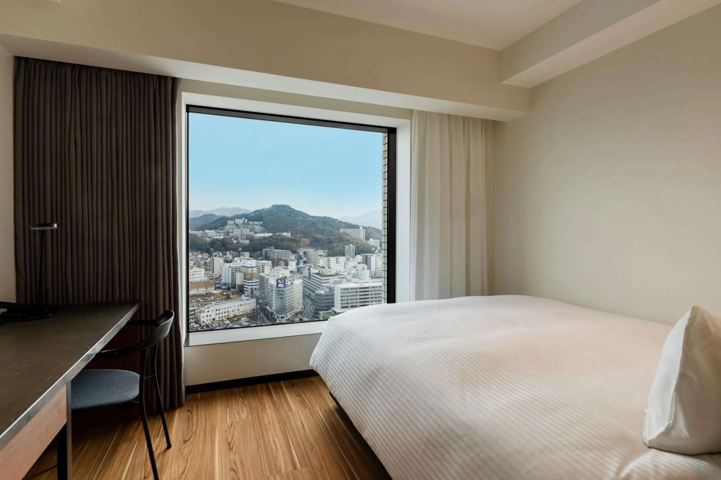 Bed in HOTEL GRANVIA HIROSHIMA SOUTH GATE Bed in HOTEL GRANVIA HIROSHIMA SOUTH GATE