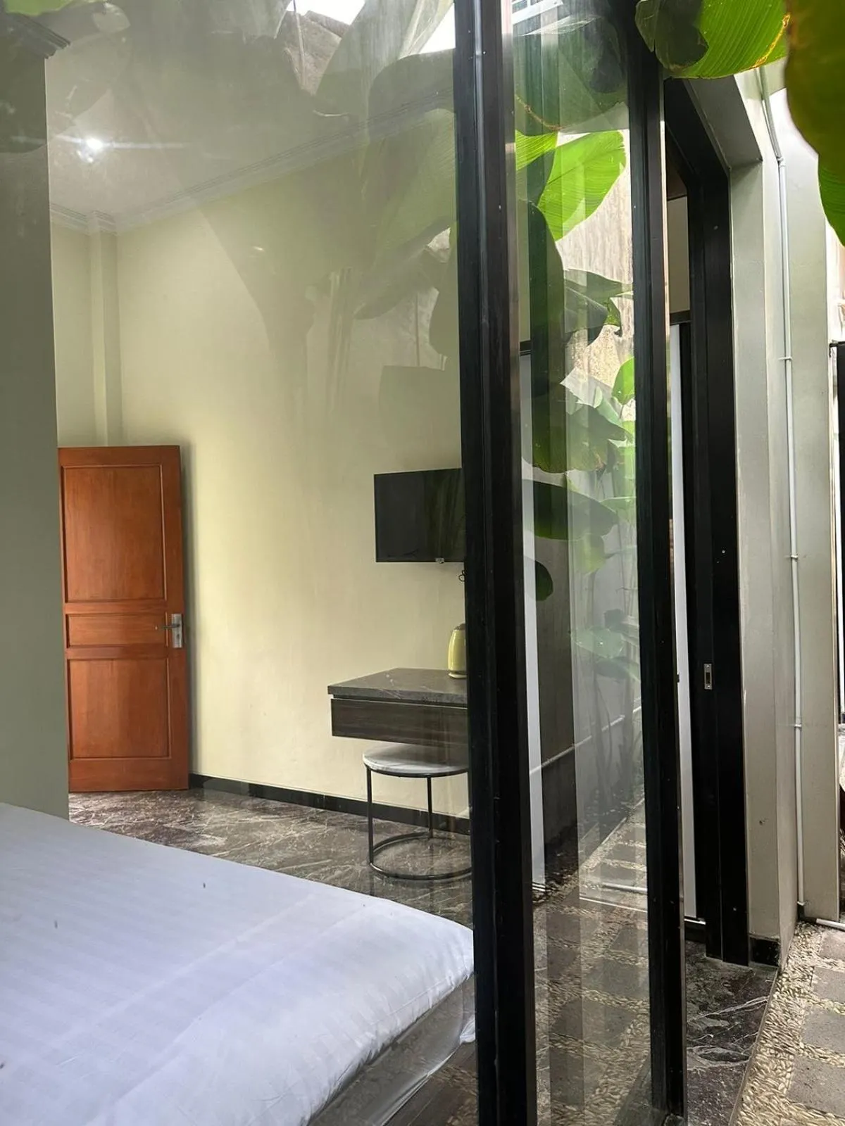 TV and multimedia, Bed in Nofrah House Syariah Mitra RedDoorz