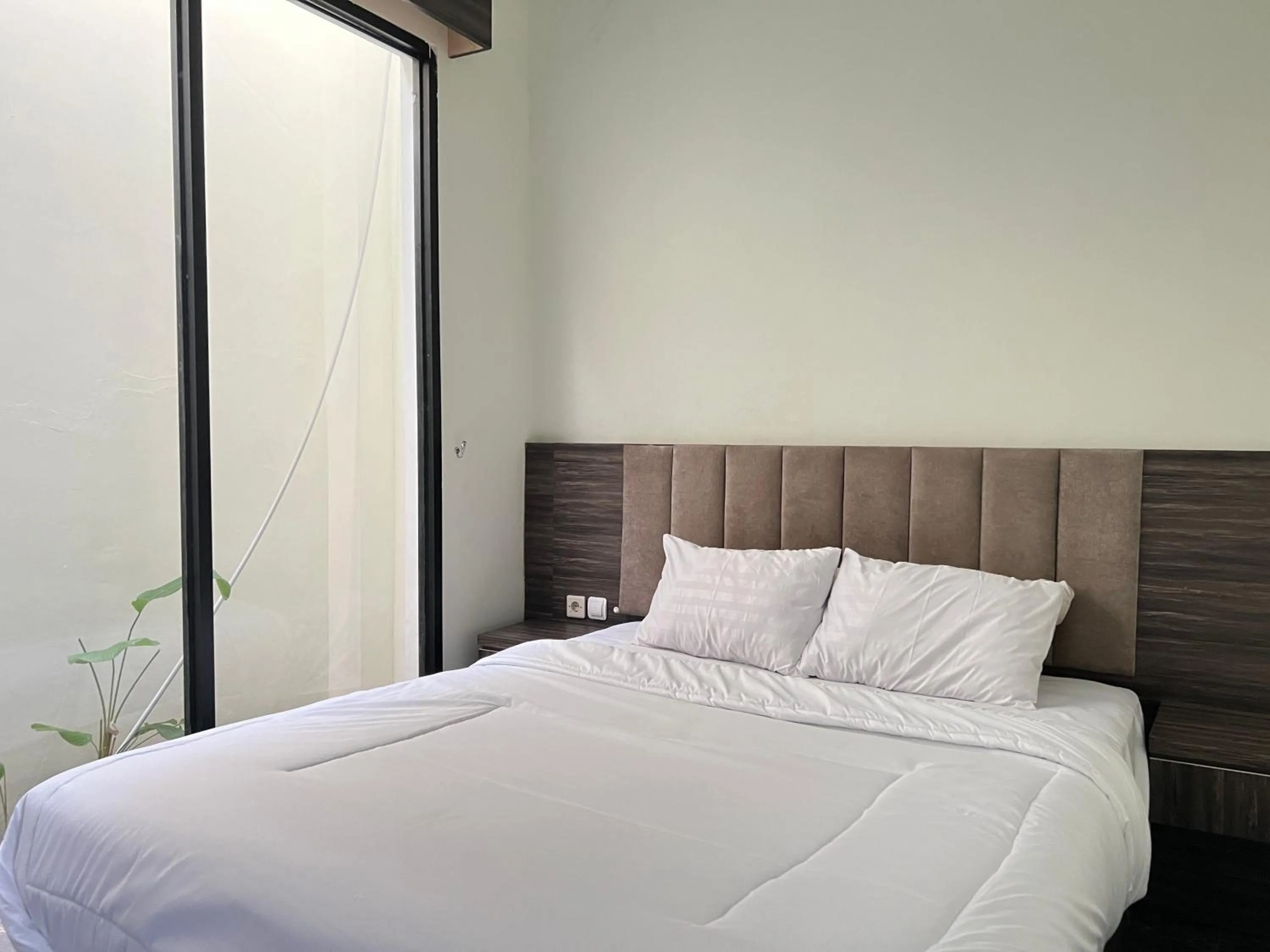 Bedroom, Bed in Nofrah House Syariah Mitra RedDoorz