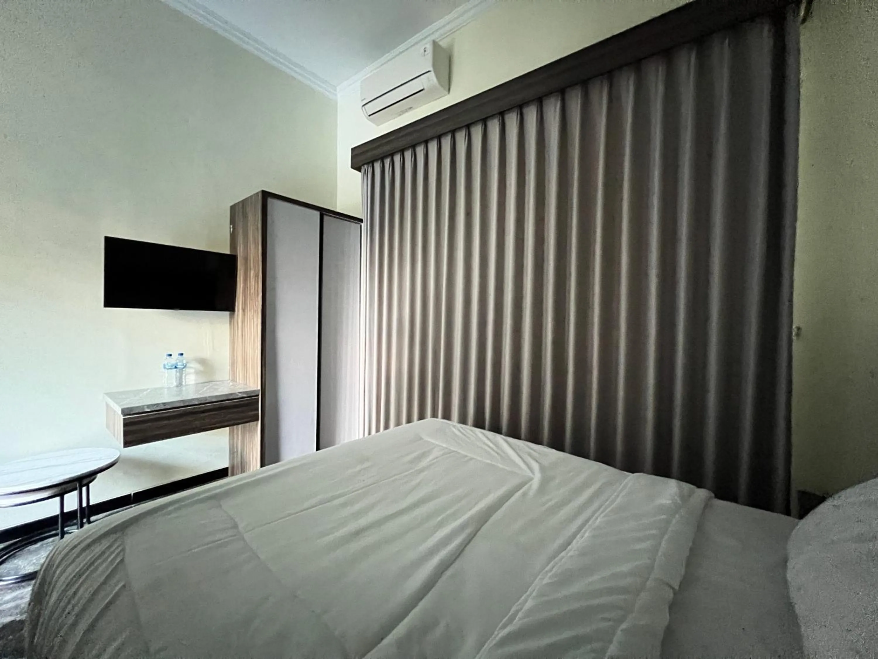 Bedroom, Bed in Nofrah House Syariah Mitra RedDoorz