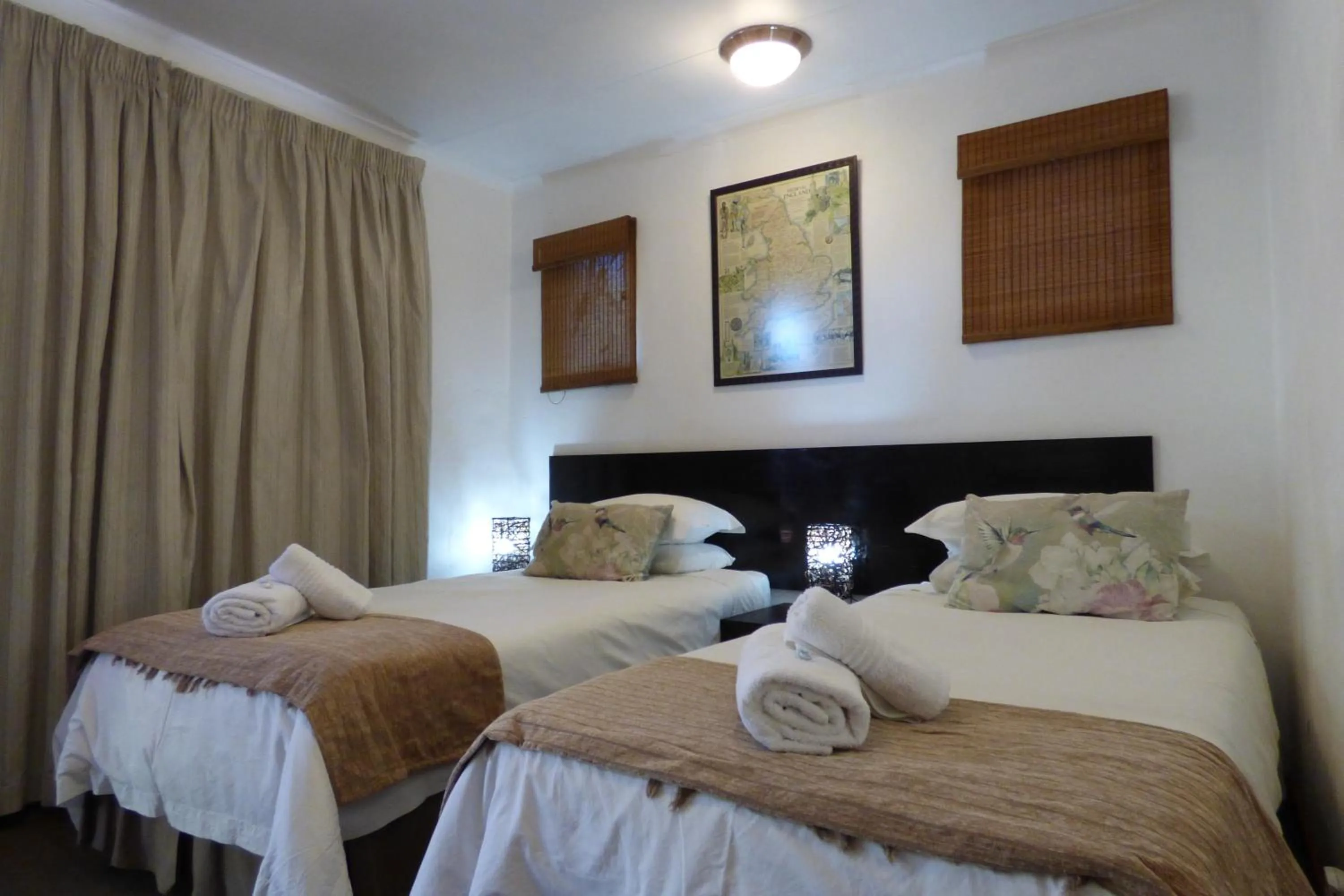 Bed in Pennylane Guest House