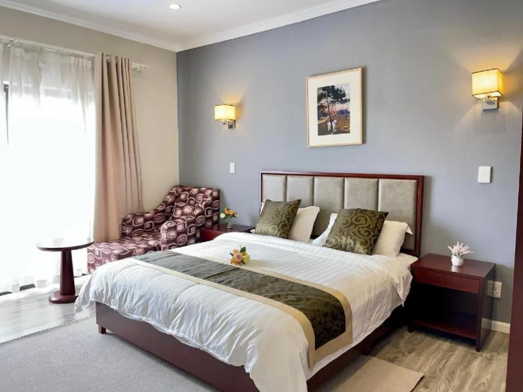 Bed in Atlantic Pearl Guest House Rivonia
