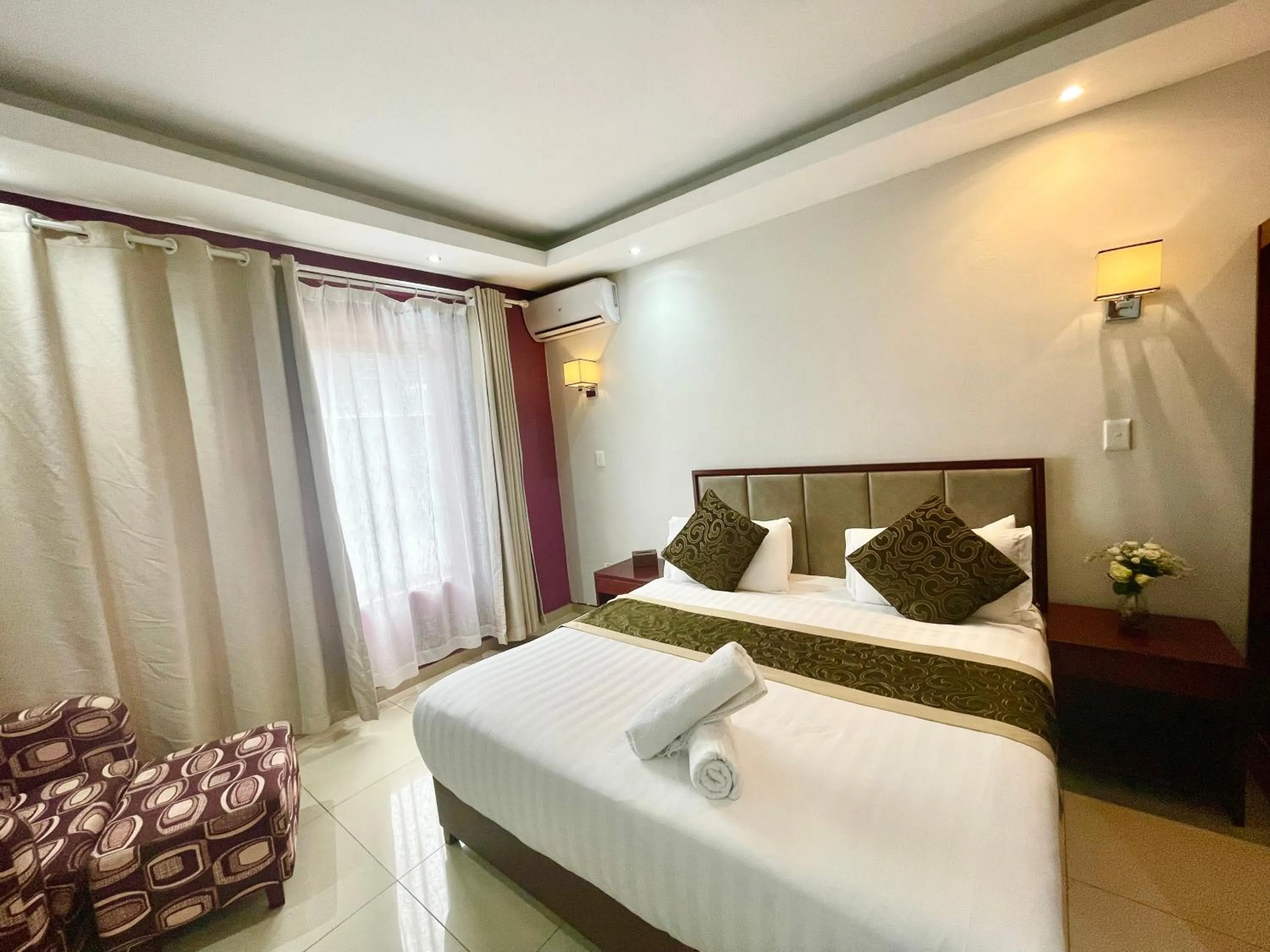 Photo of the whole room, Bed in Azinnia Rivonia Guest House