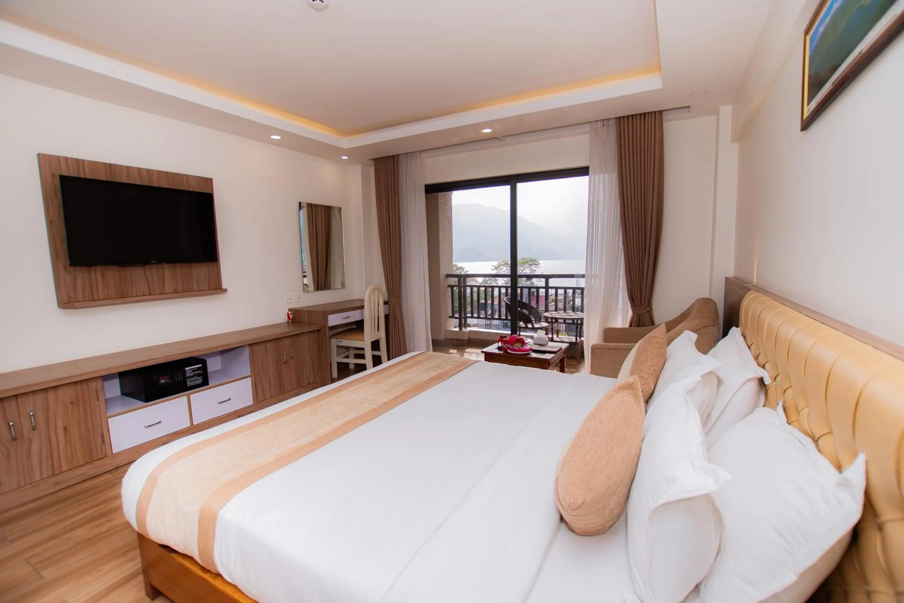 Bedroom, Bed in Hotel Pokhara Village & SPA