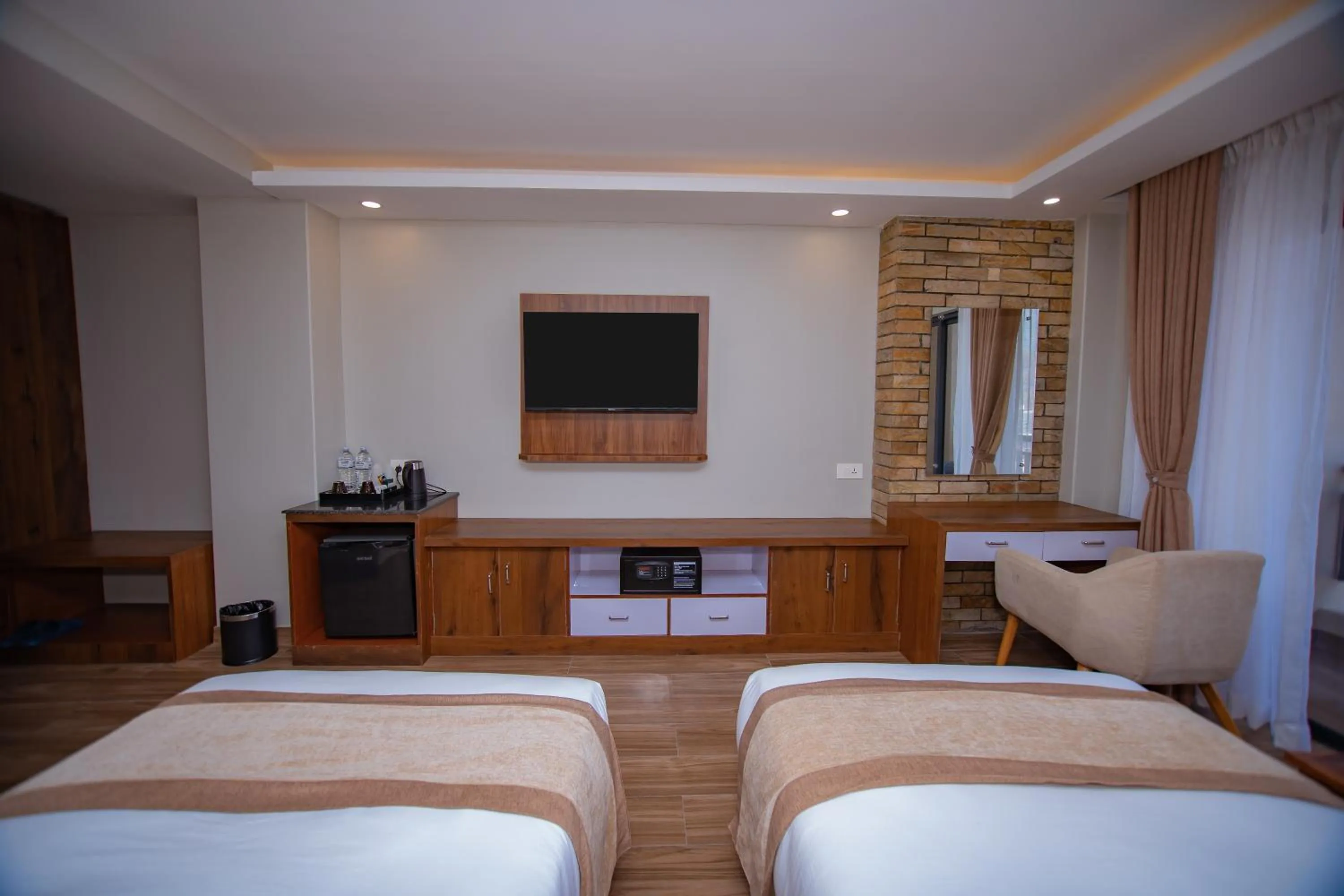 Bed in Hotel Pokhara Village & SPA