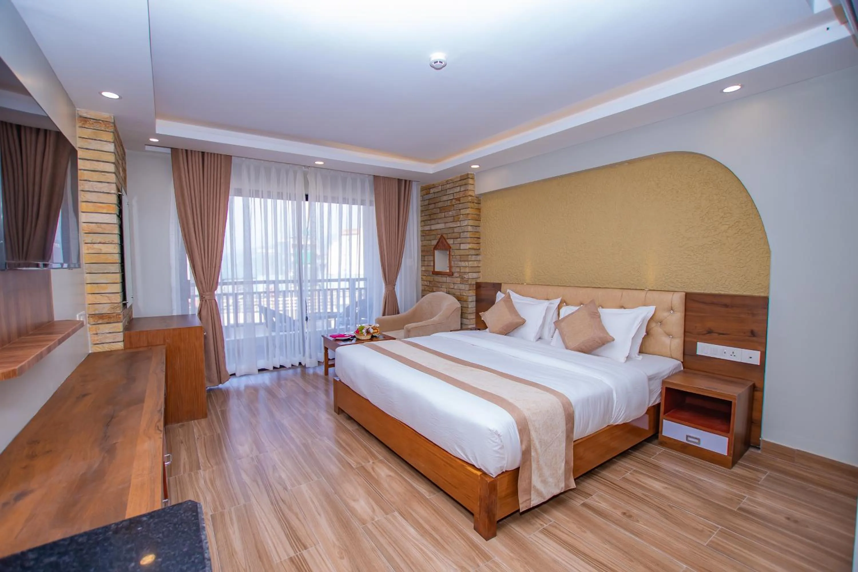 Bed in Hotel Pokhara Village & SPA